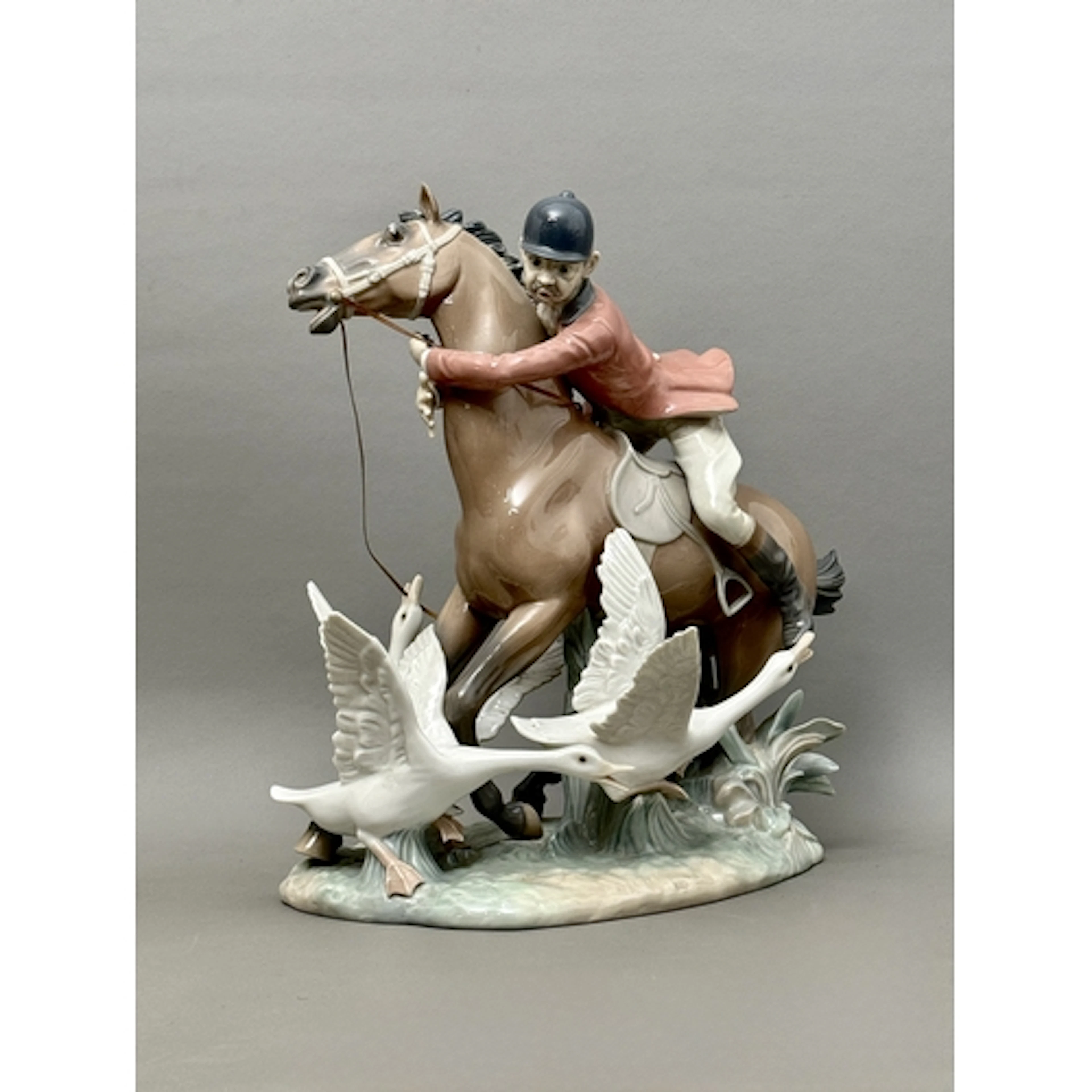A large Lladro hunting figural group - 'The Race', depicting...