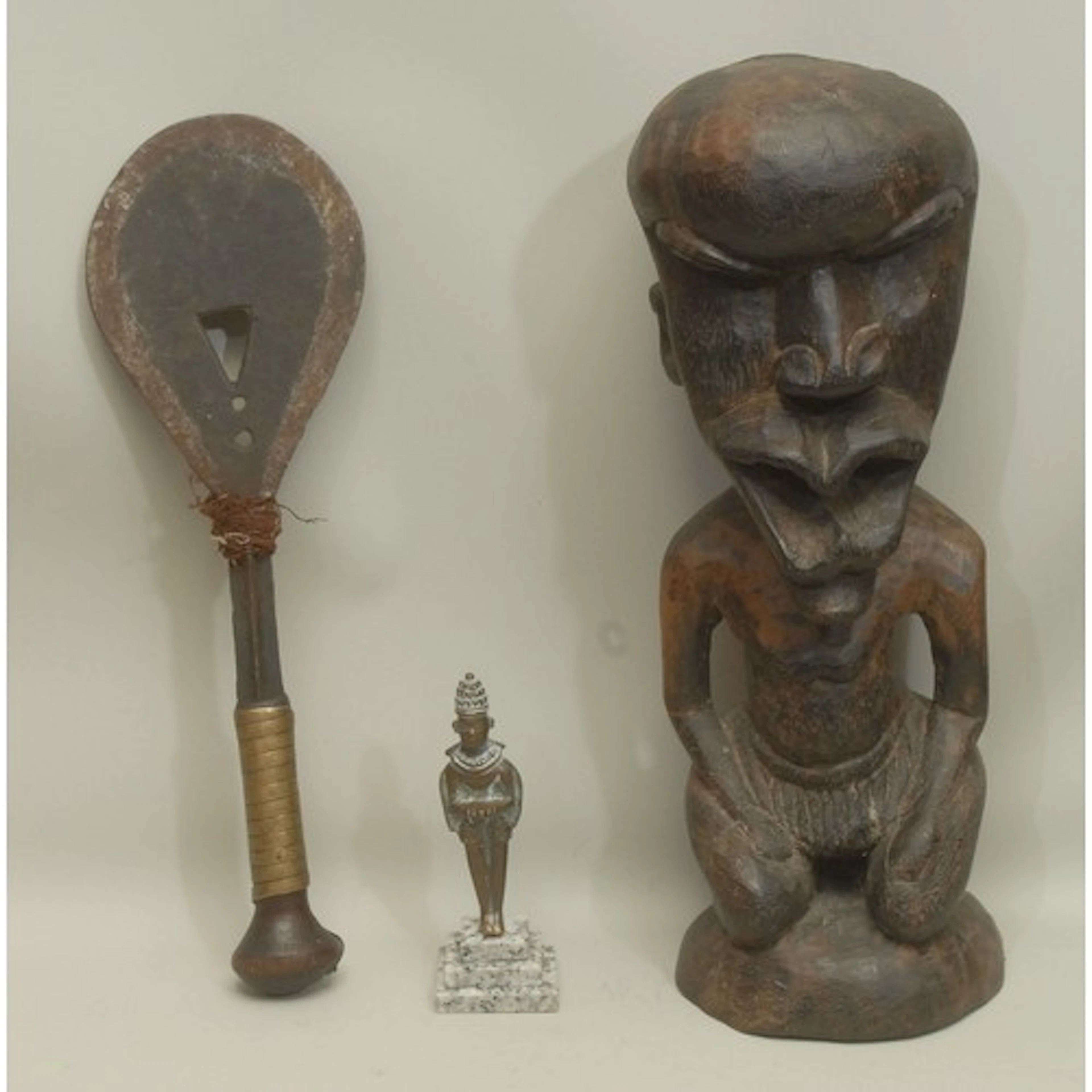 Tribal Art - a Baule rosewood reliquary figure, 40cm high ov...