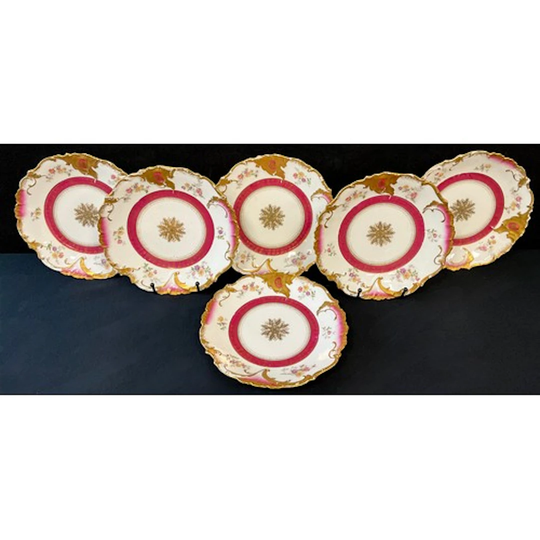 A set of six Limoges France cabinet plates, scrolling gilt r...