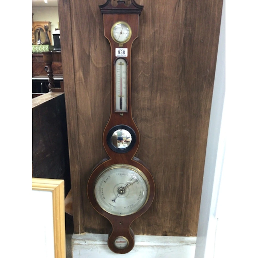 A late George III banjo barometer with silvered dial mercury...