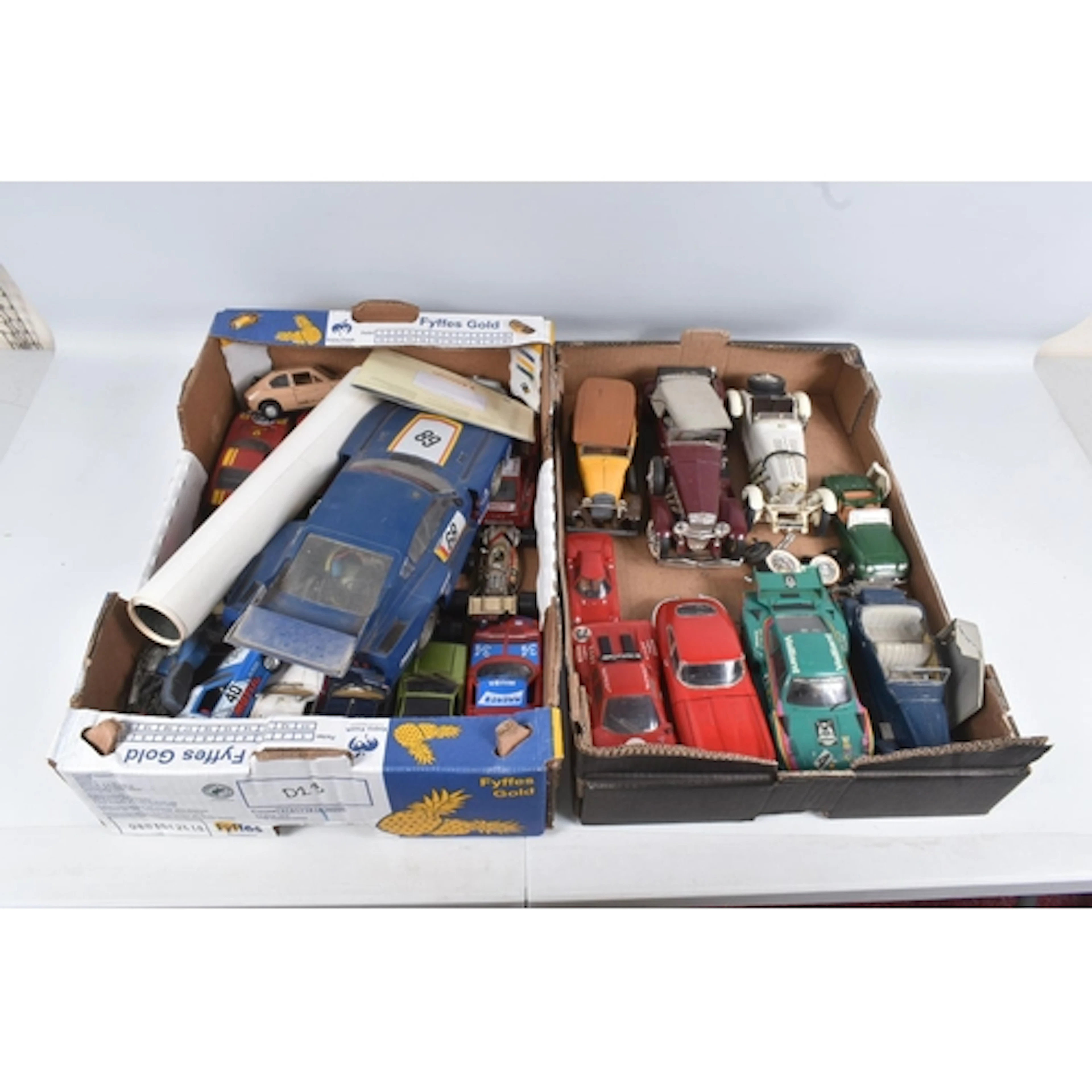 A QUANTITY OF UNBOXED MODEL VEHICLES, to include an RC Tomiy...
