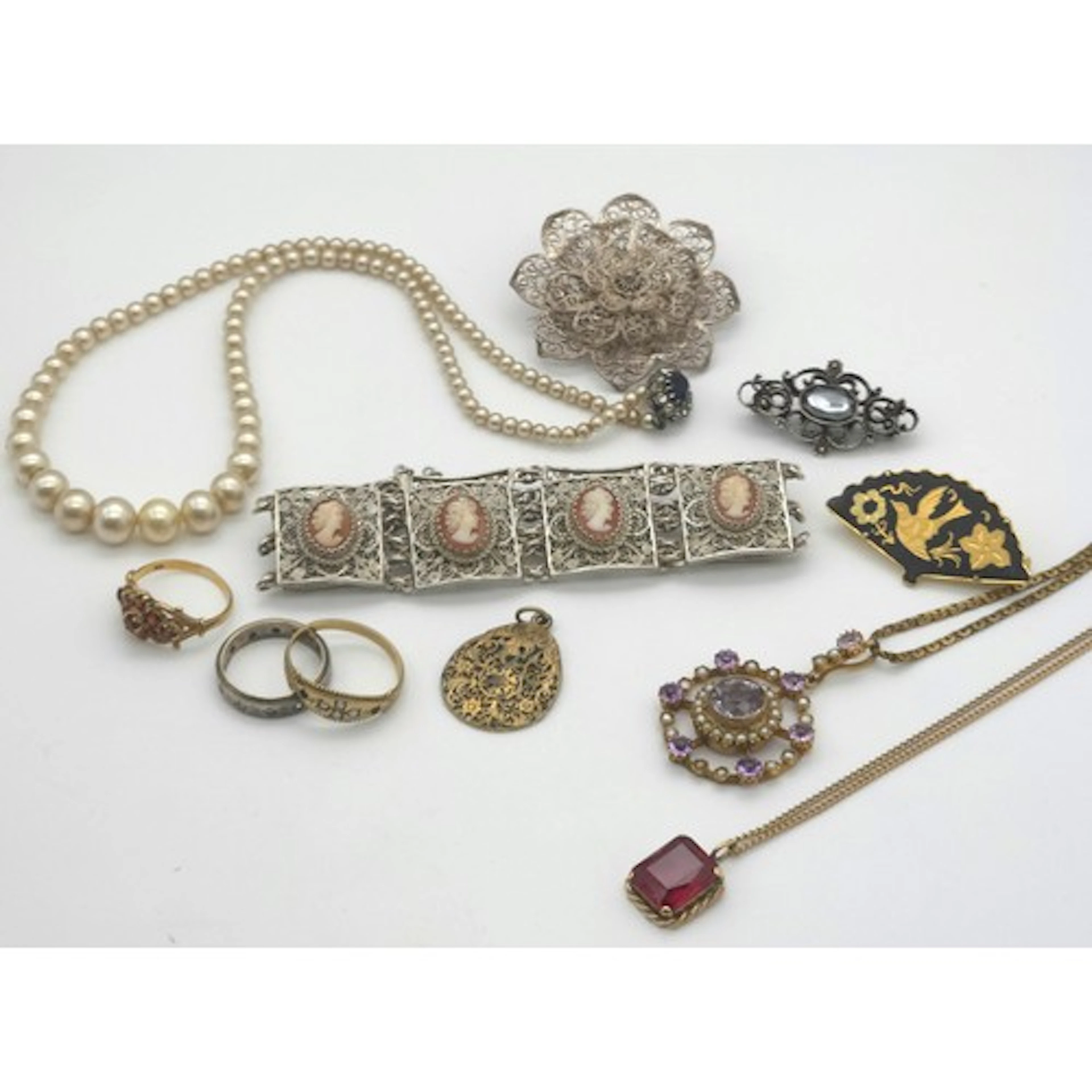 A Victorian style amethyst and seed pearl pendant, of open-w...