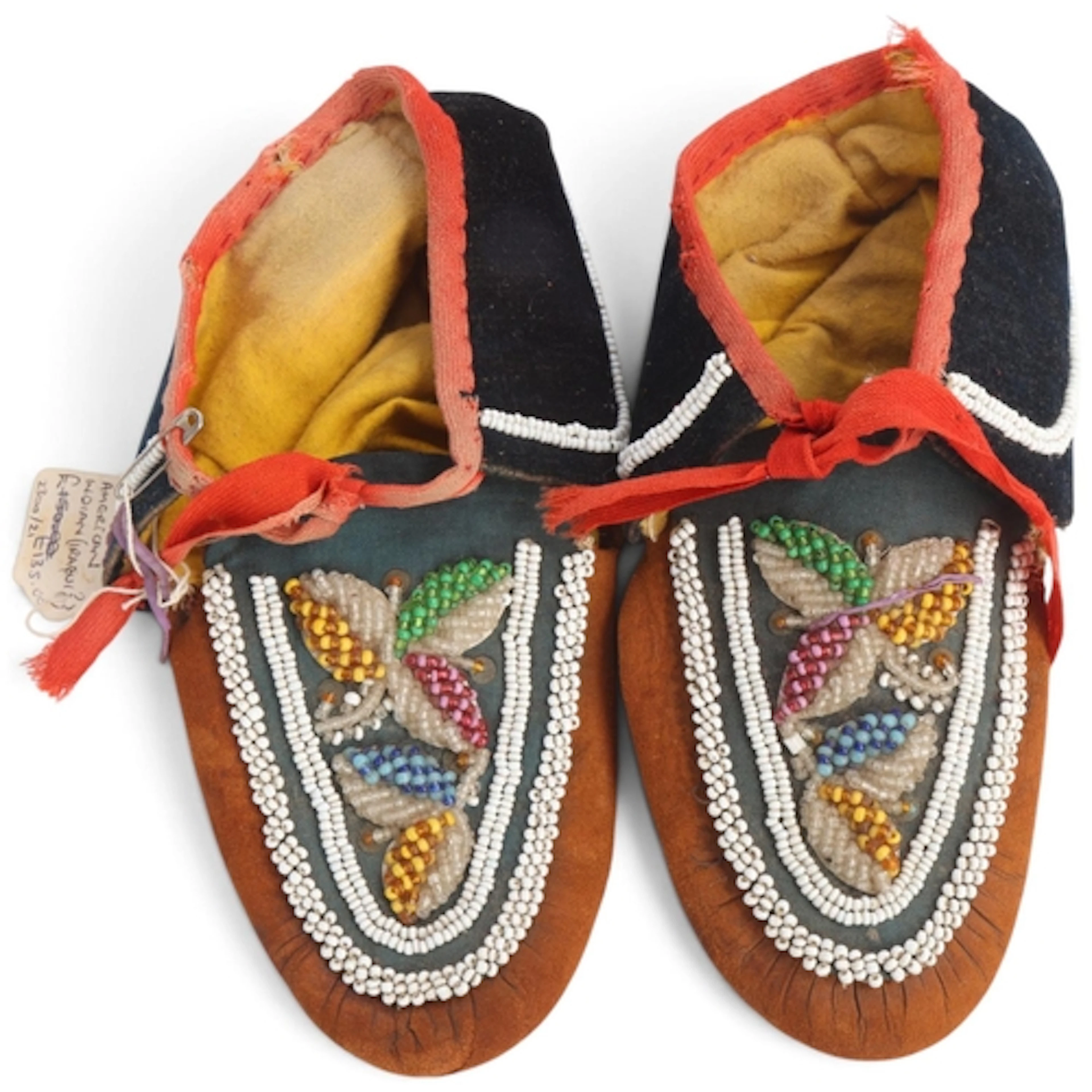 A pair of Iroquois Native American beaded hide moccasins, le...