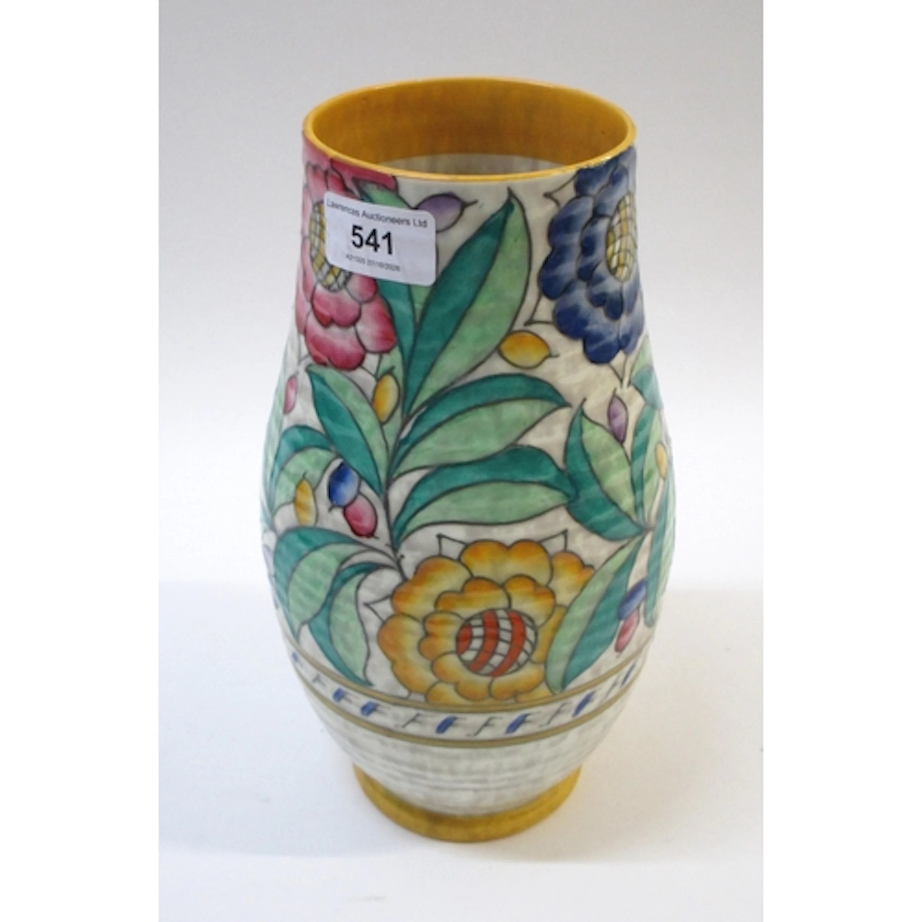 Charlotte Rhead, for Crown Ducal, a baluster form vase, with...