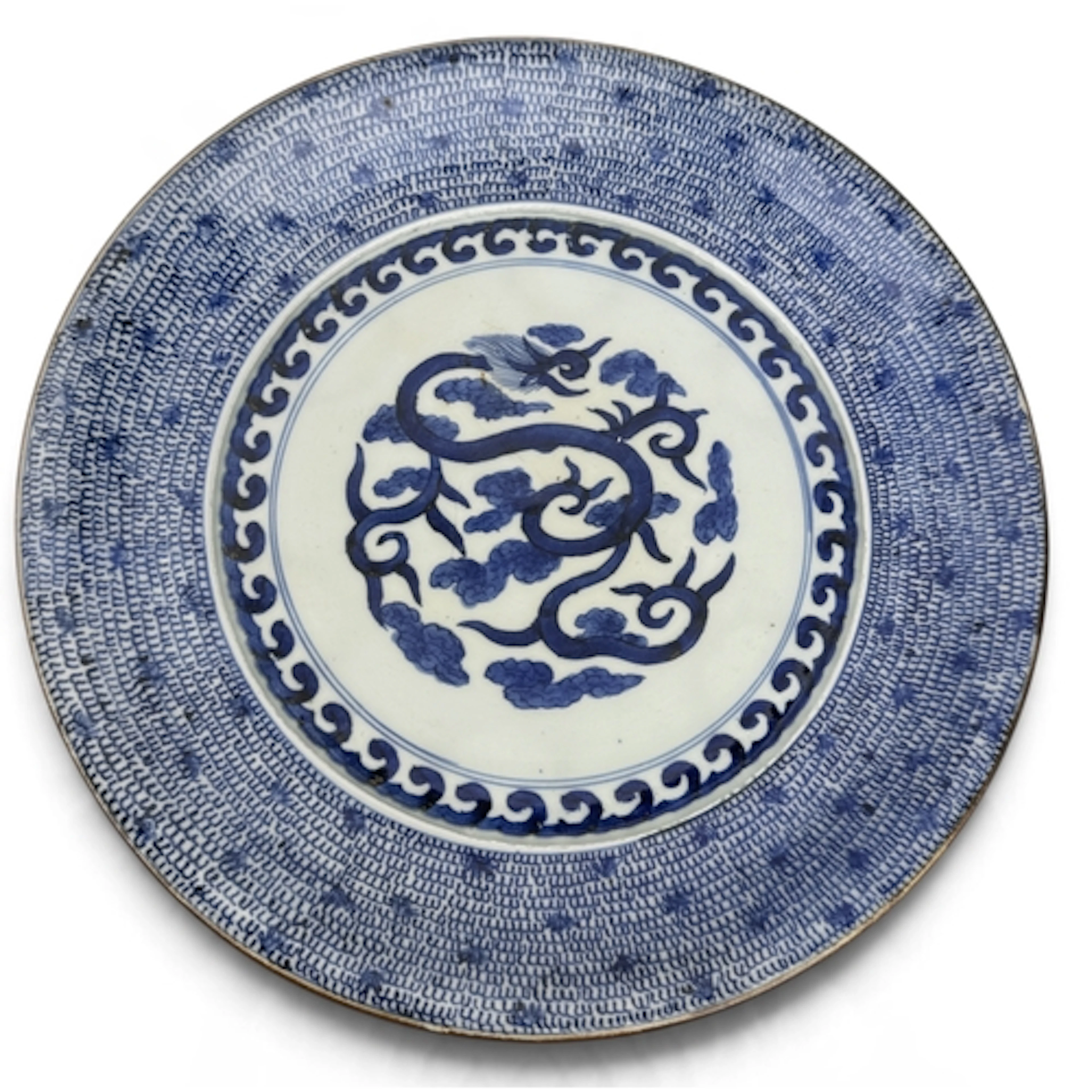 A CHINESE 20TH CENTURY BLUE AND WHITE DISH The centre decora...