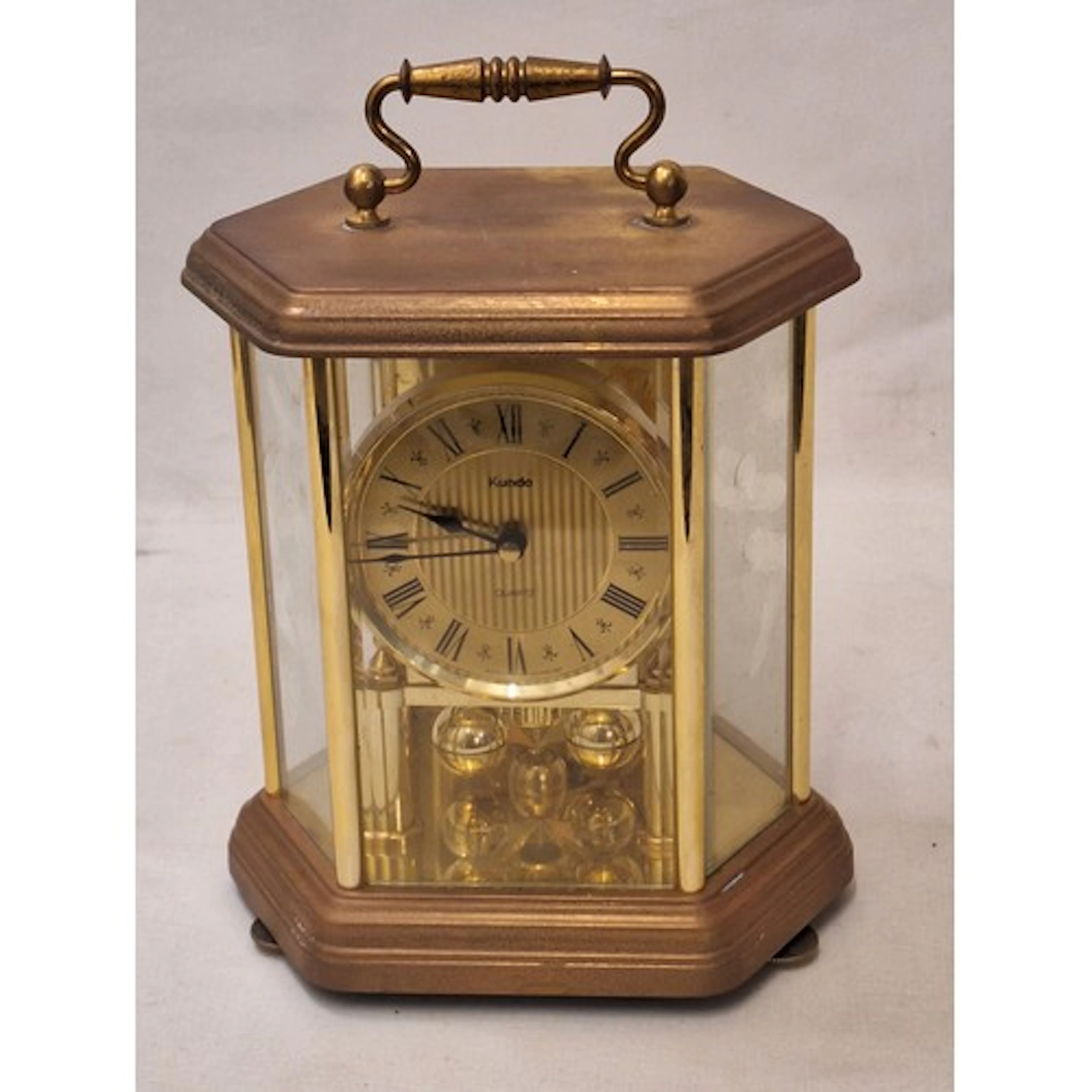 Kundo Gold Tone Carriage Clock with rotating pendulum approx...