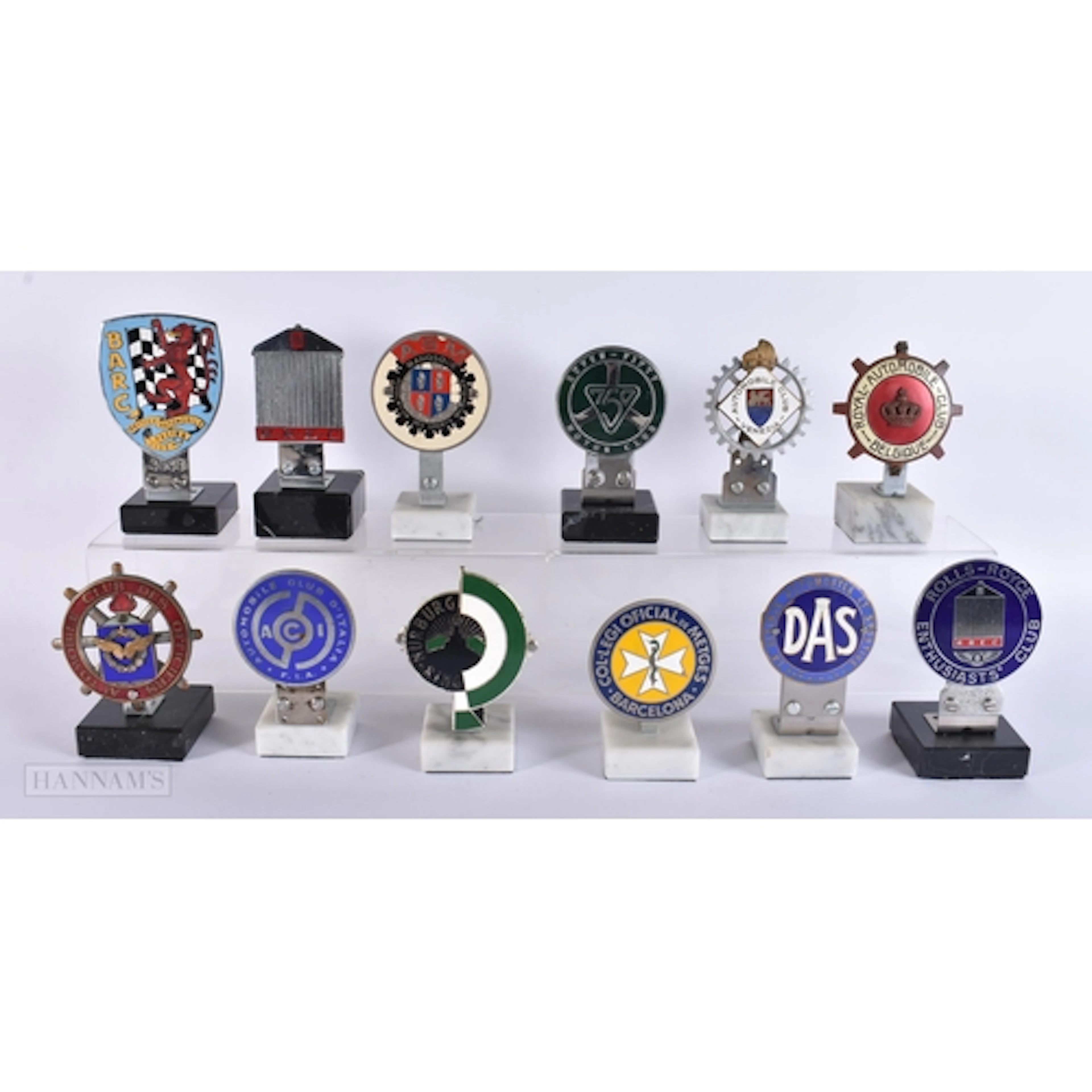 A COLLECTION OF TWELVE ENAMELLED TOURING CLUB BADGES includi...