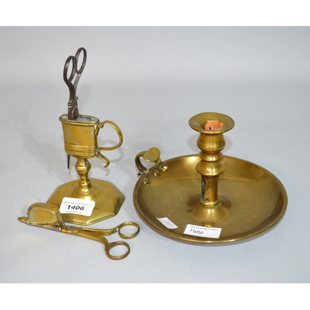 18th Century brass snuffer stand, together with a brass cand...