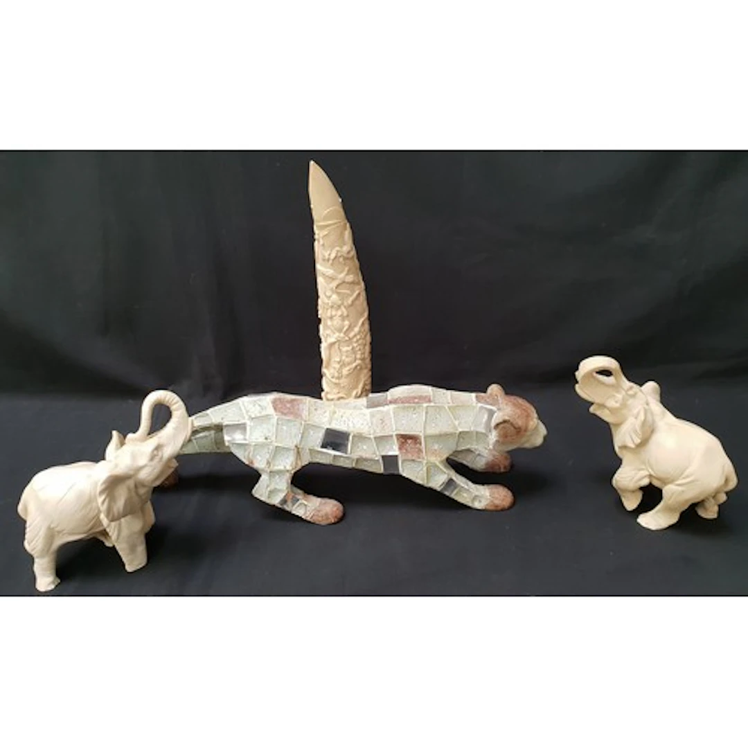 PAIR OF RESIN ELEPHANTS together with a resin elephant tusk...