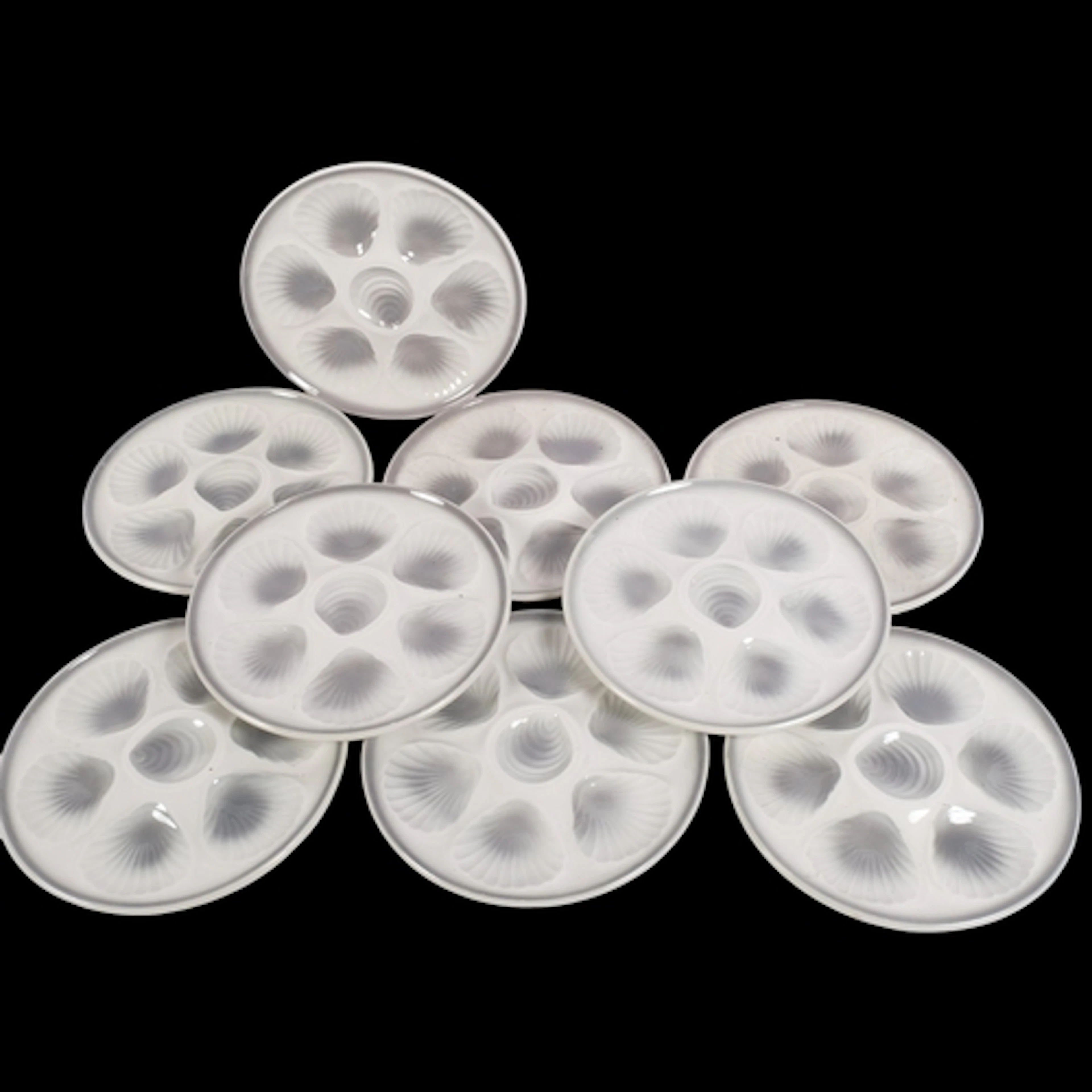 A set of 9 French ceramic oyster plates, 24cm