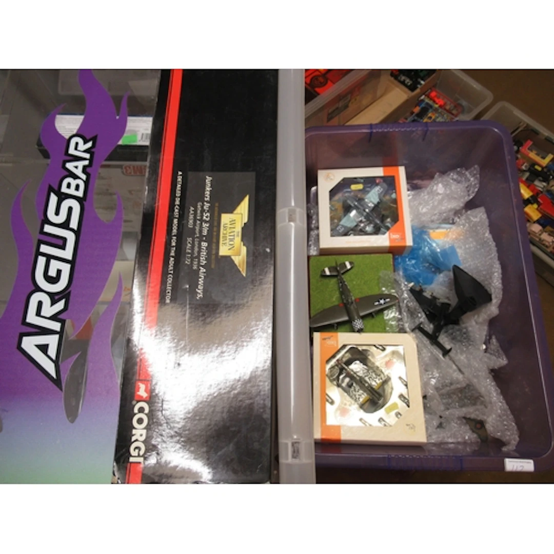 Two boxes containing a quantity of aviation related models