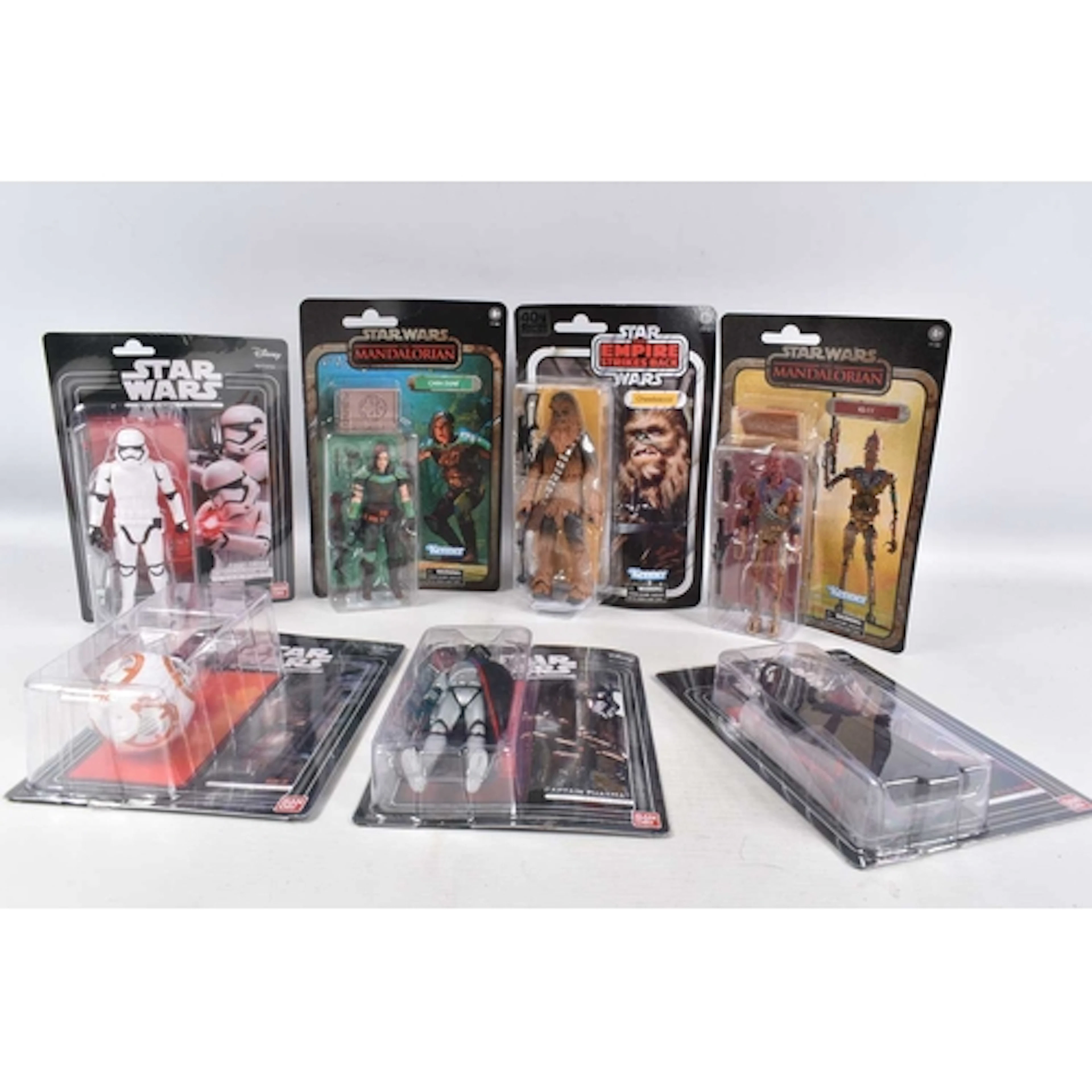 SEVEN BOXED DISNEY HASBRO AND BANDAI STAR WARS FIGURES, to i...