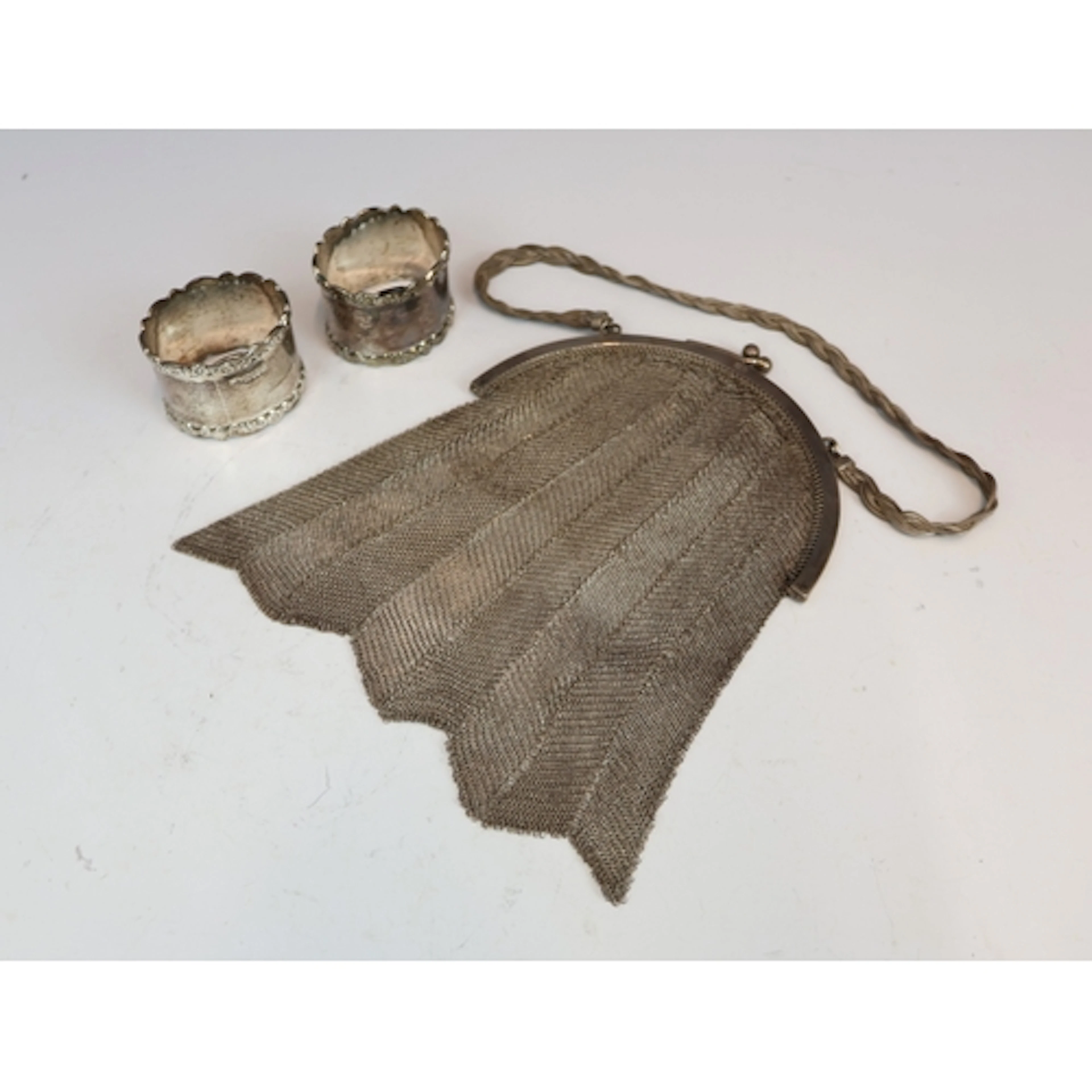 An Art Deco silver mesh bag London 1923, the silver frame su...