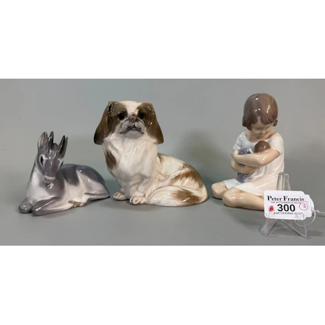 Royal Copenhagen porcelain study of a Pekinese dog, together...