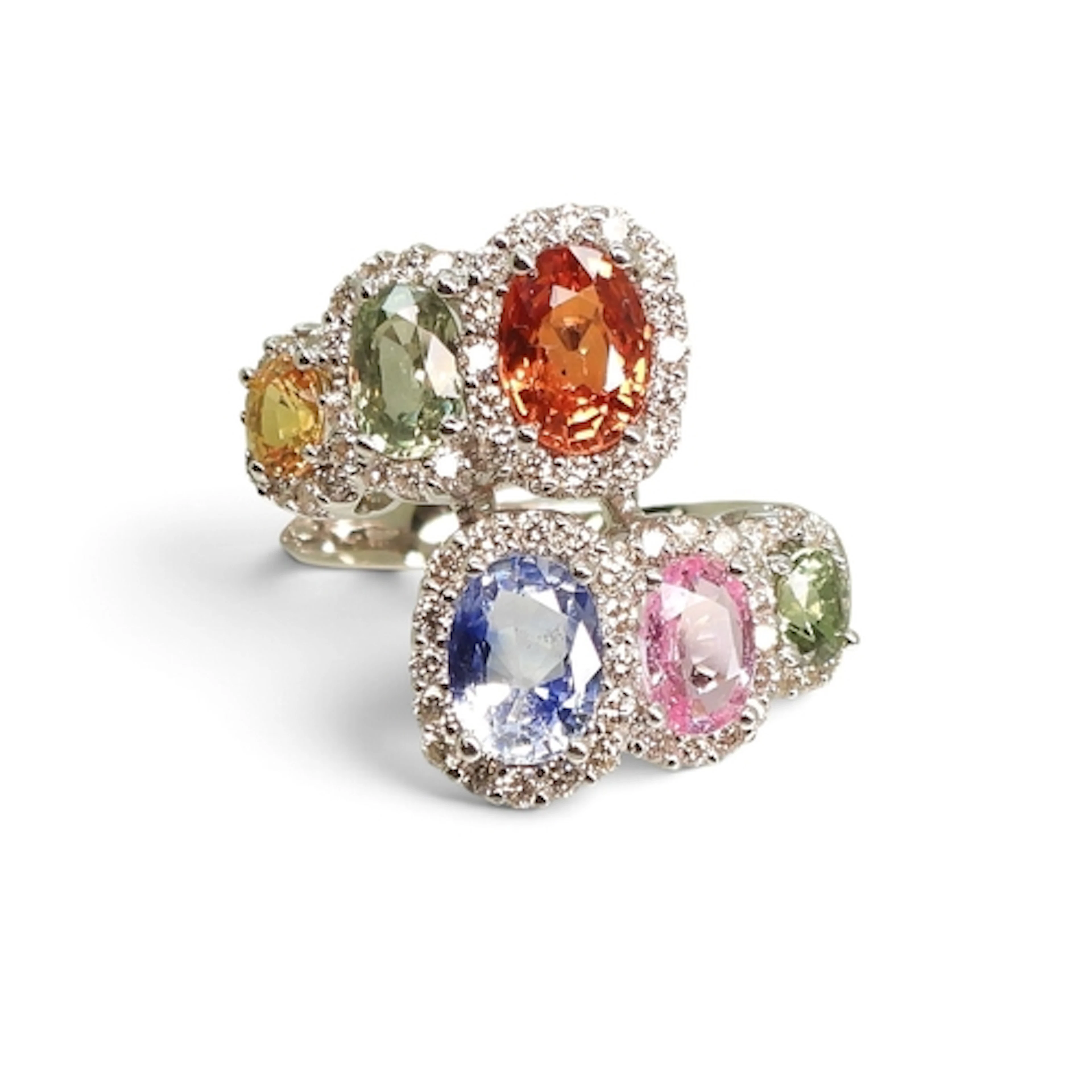 A MIXED SAPPHIRE CLUSTER RING made in 18ct white gold full U...