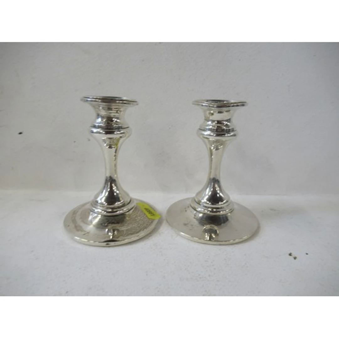 A pair of loaded silver dwarf candlesticks, height 4ins