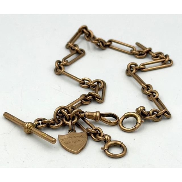 A 9ct gold Albert chain with engraved shield, approximate we...