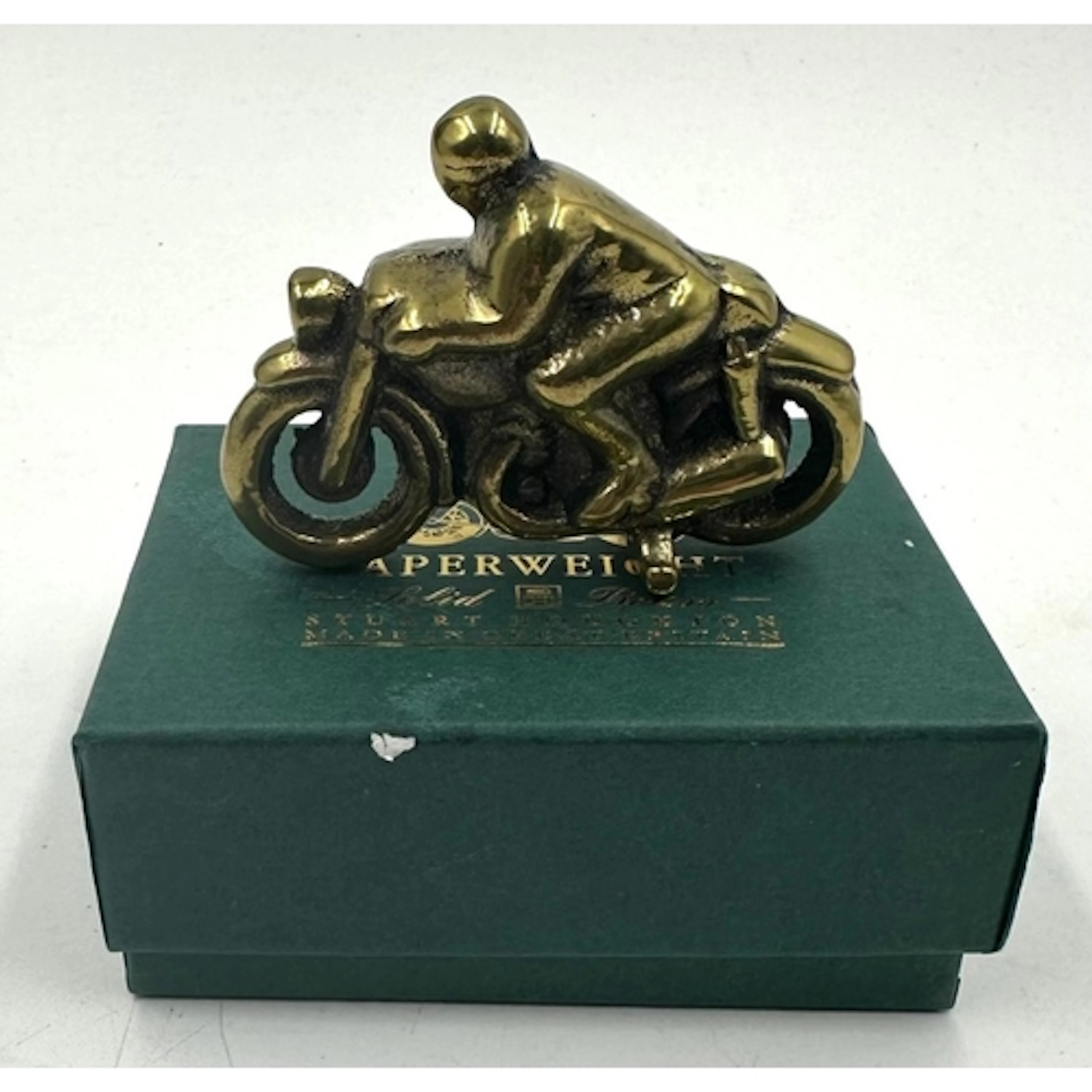 A Brass paperweight in the form of a vintage motorcycle.