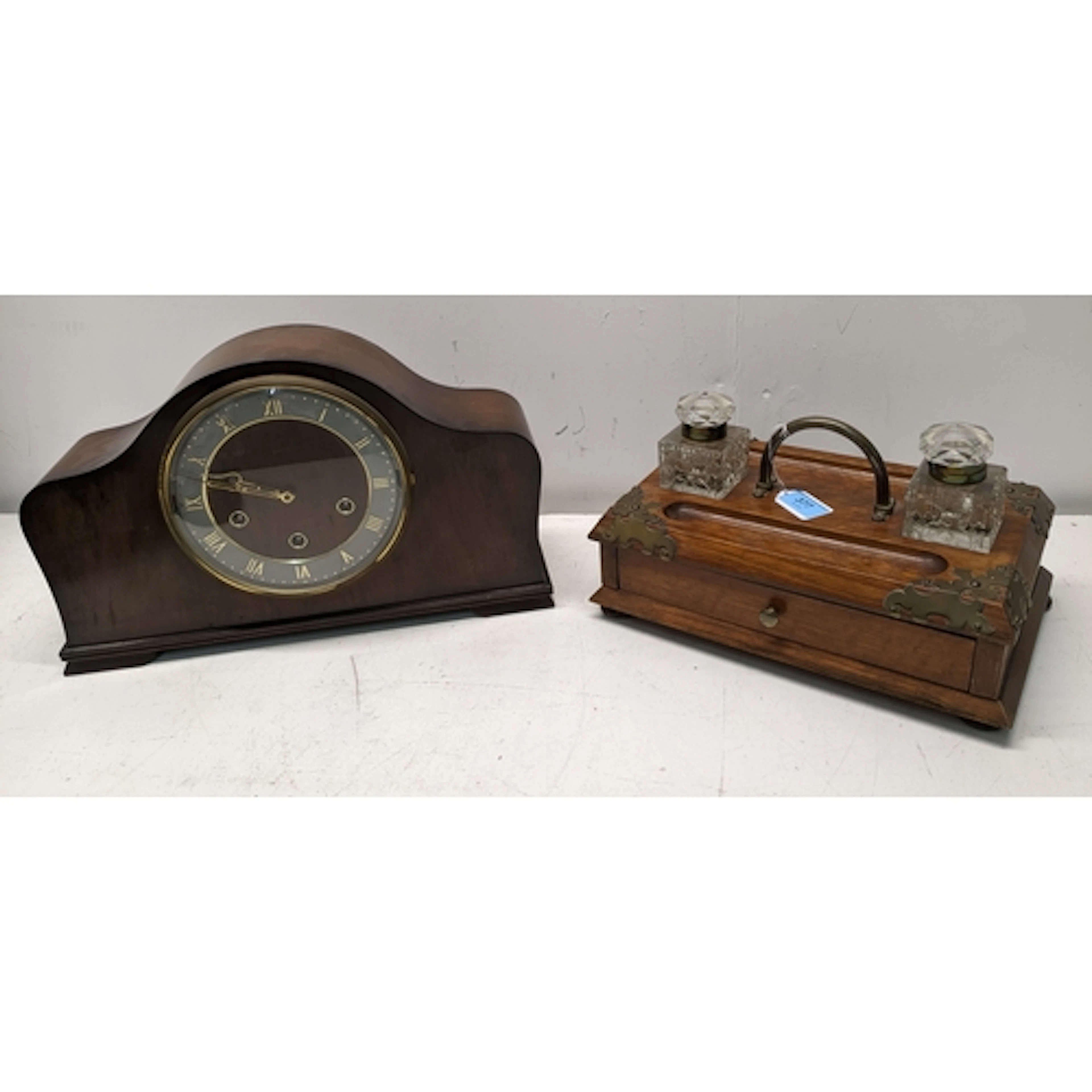 A Victorian oak desk ink stand, brass corner mounts, base dr...