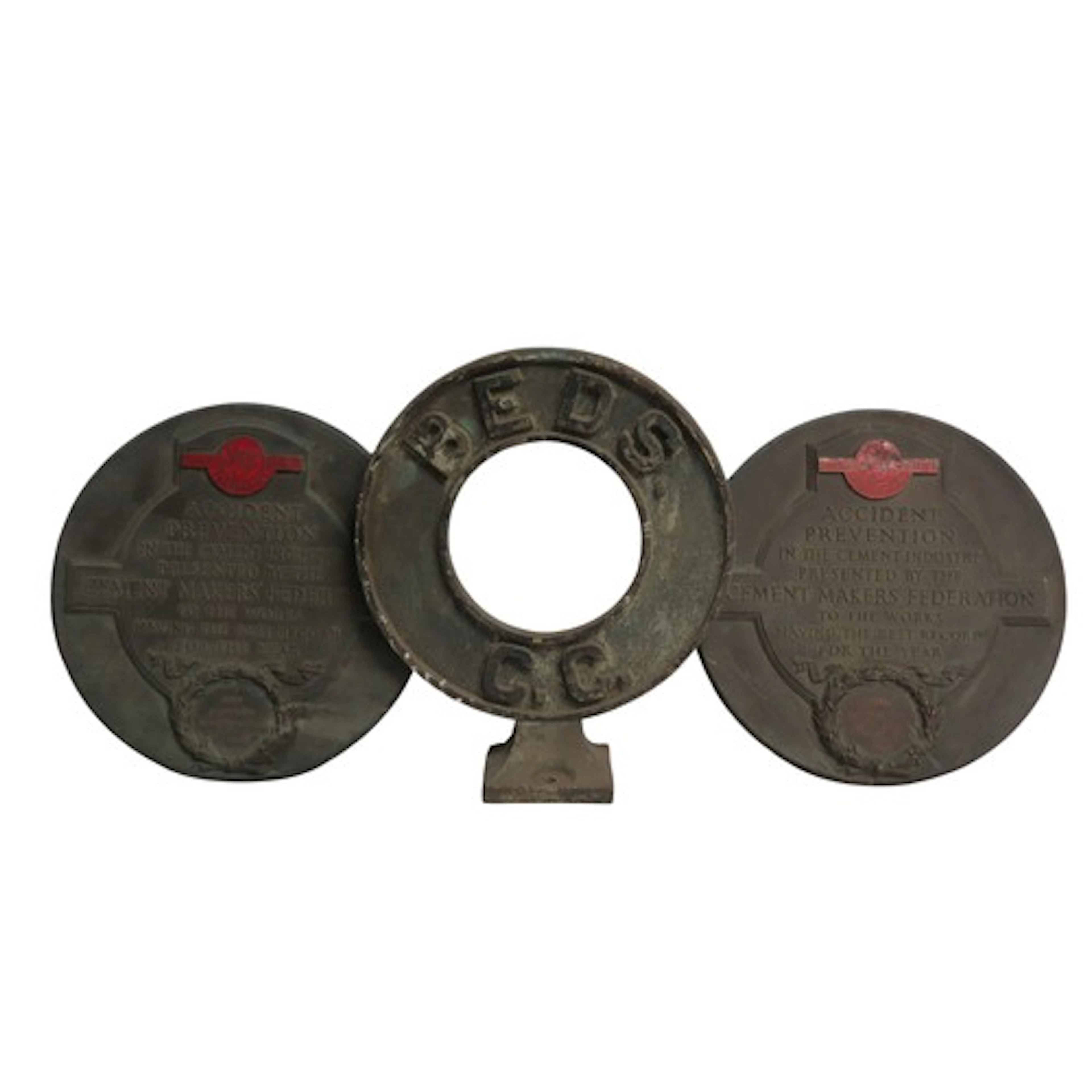 A CAST IRON RING FORM SIGN inscribed 'BEDS C.C' together wi...