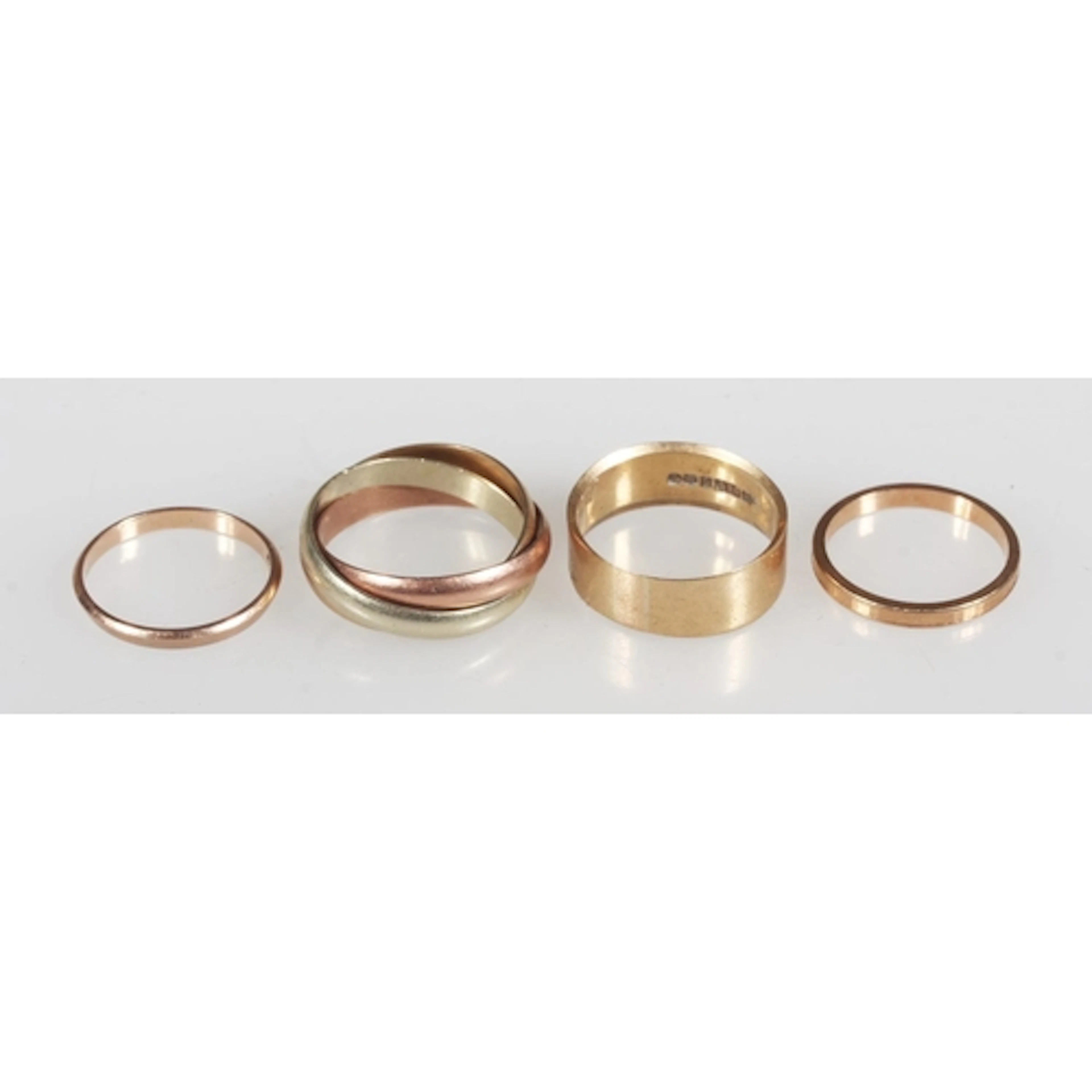 9ct gold wedding band ring, size M, two other 9ct gold rings...