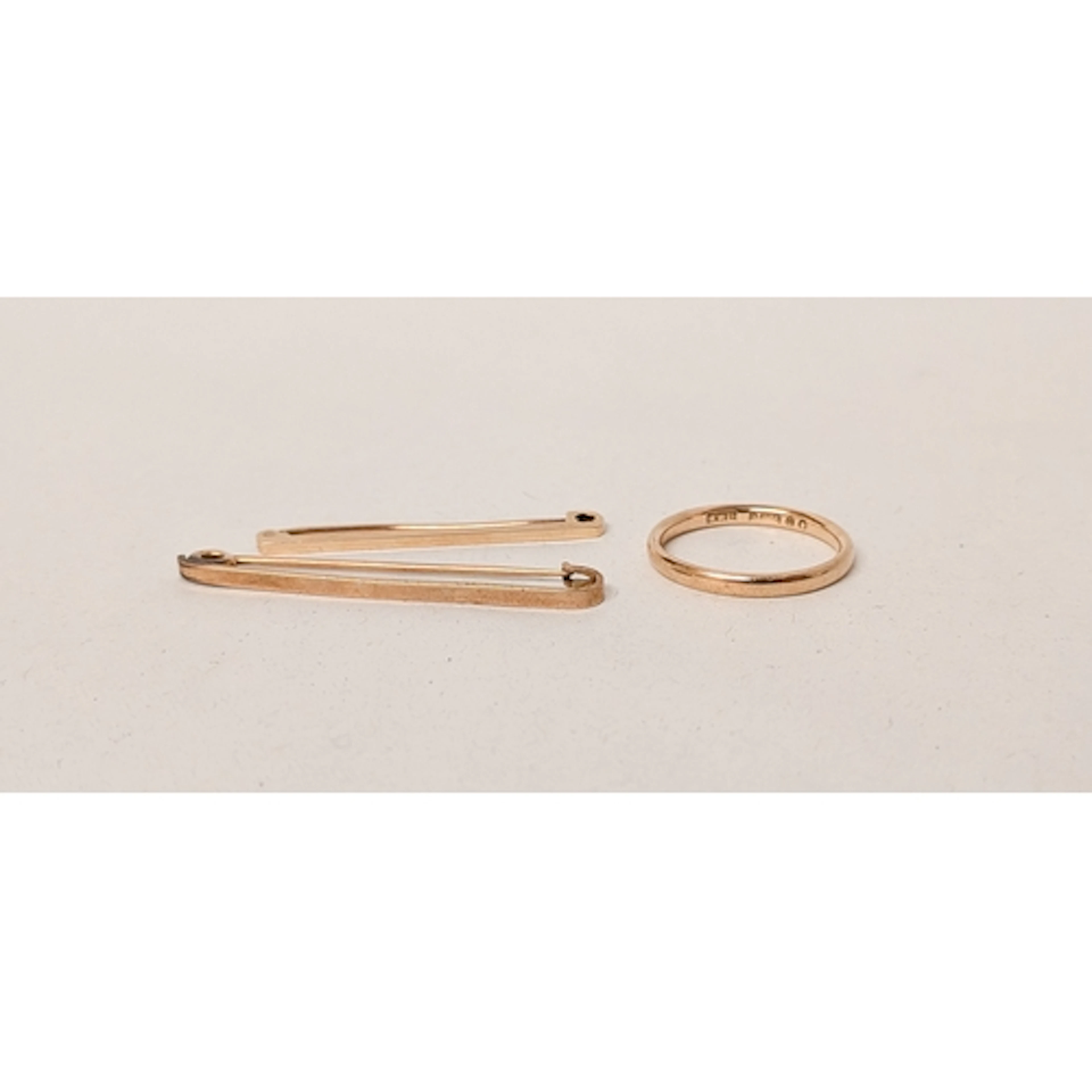 A 9ct gold wedding band, ring size Q together with a 9ct gol...