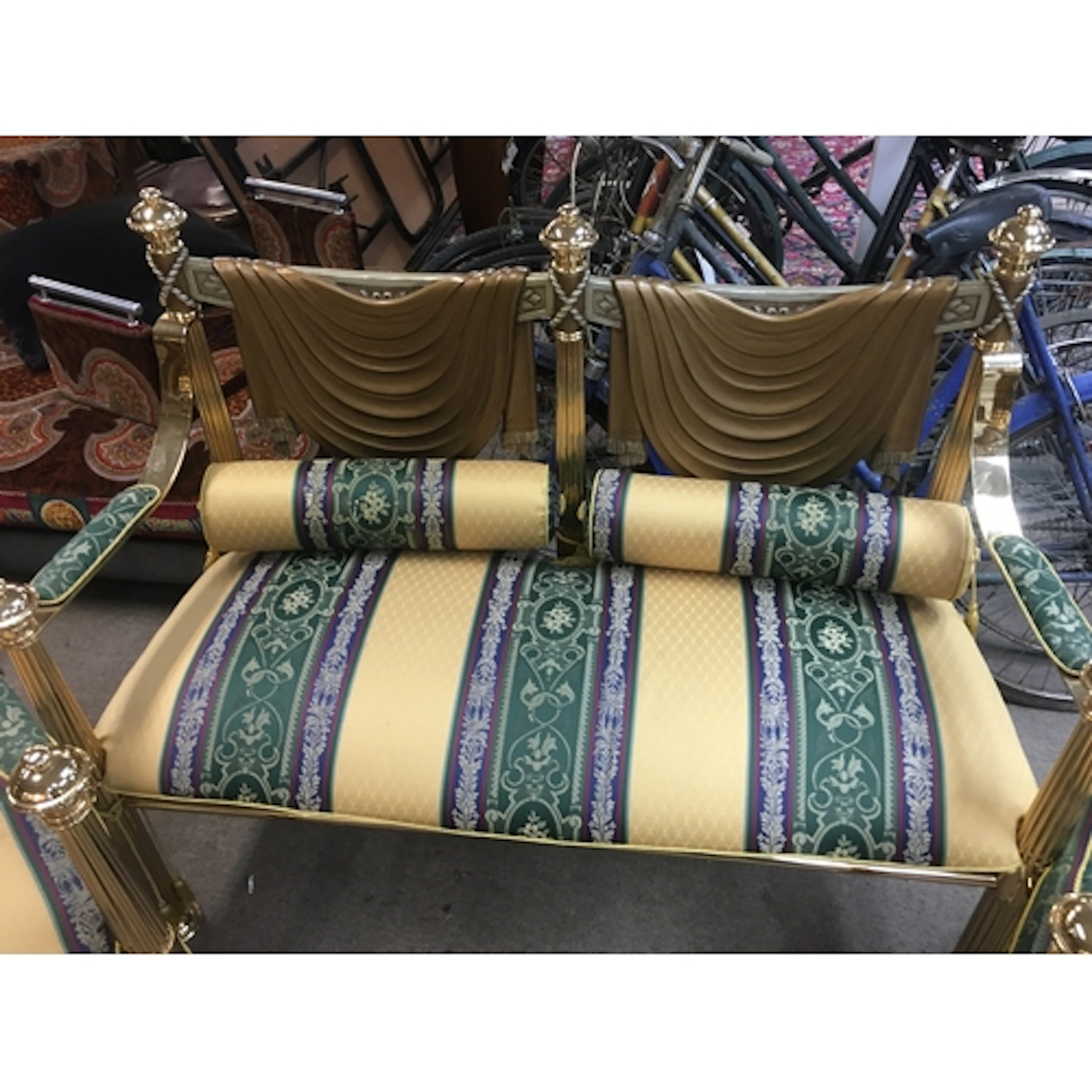 A pair of vintage Versace style gold-tone chairs with green ...