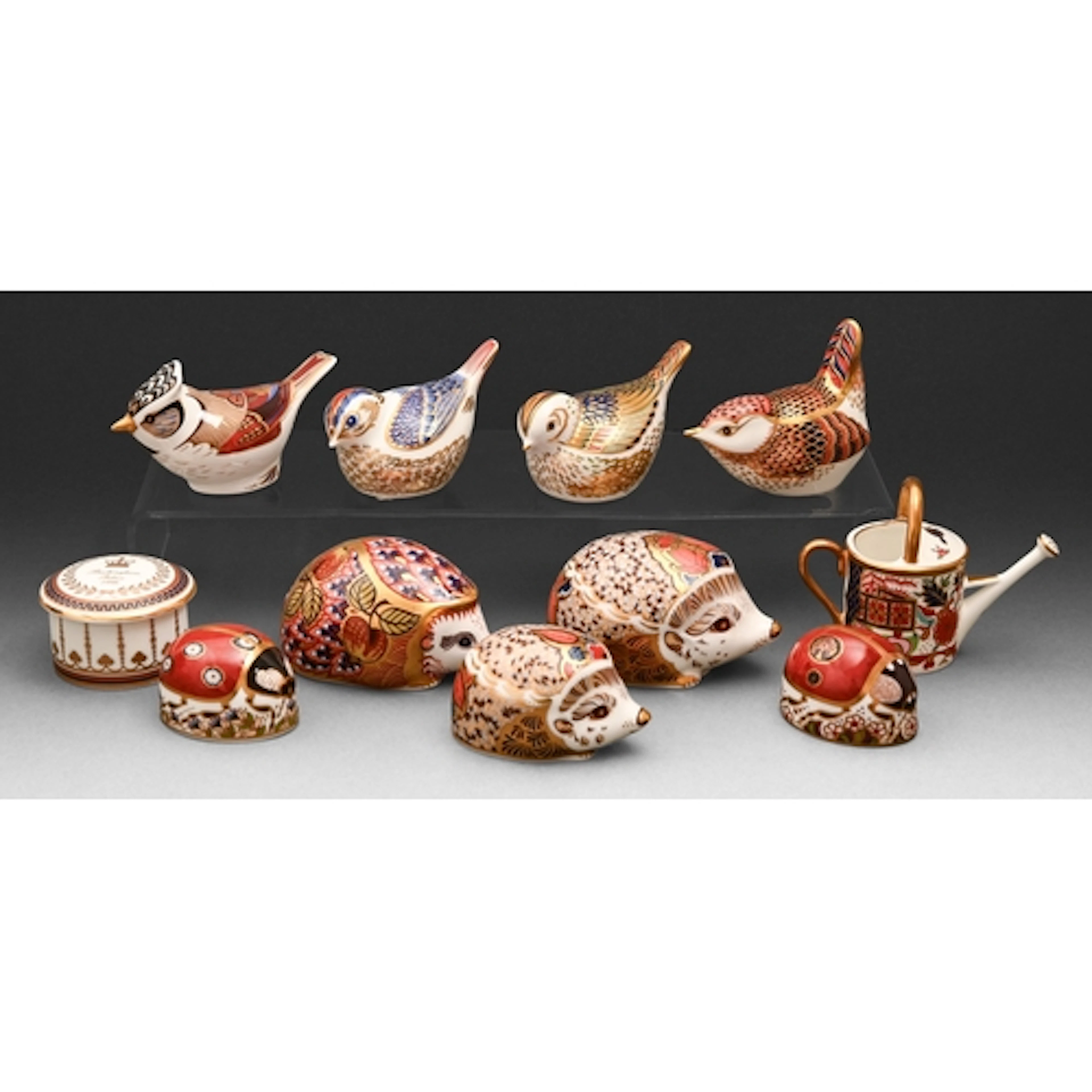 Nine Royal Crown Derby paperweights and a Rich Japan pattern...