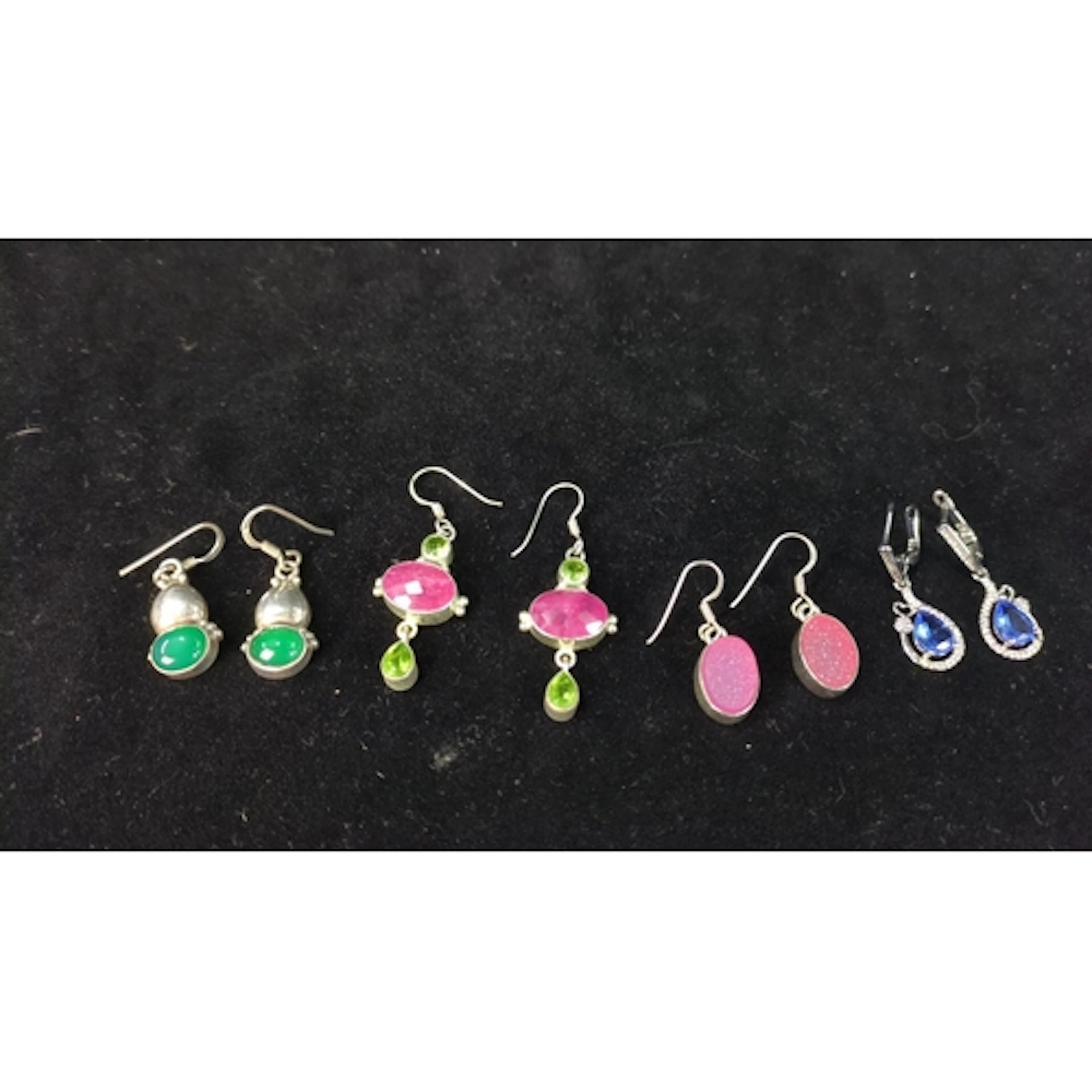 Four pairs of drop earrings: green cabochons, pink and green...