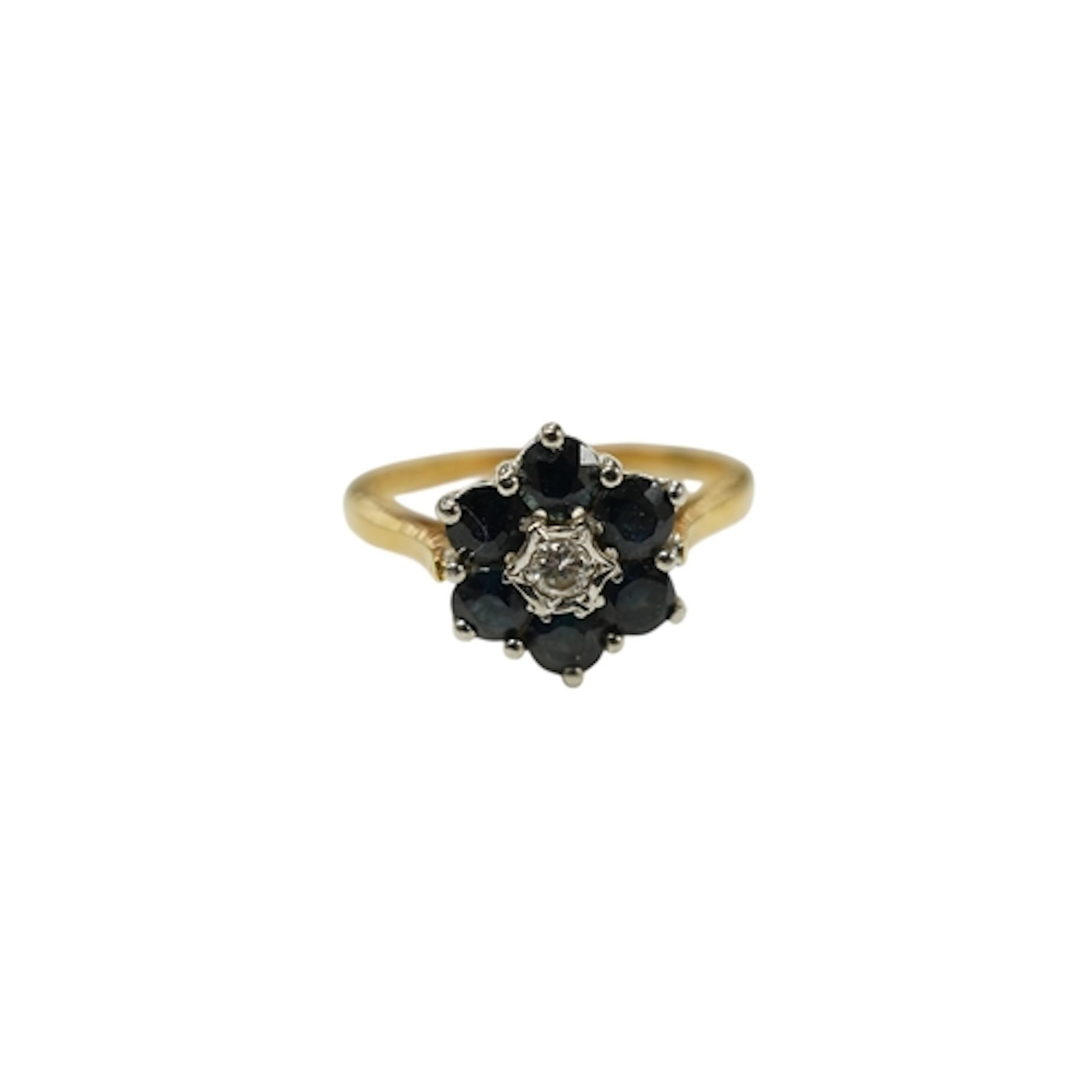 A late 1960's 18ct gold, sapphire and diamond set flower hea...