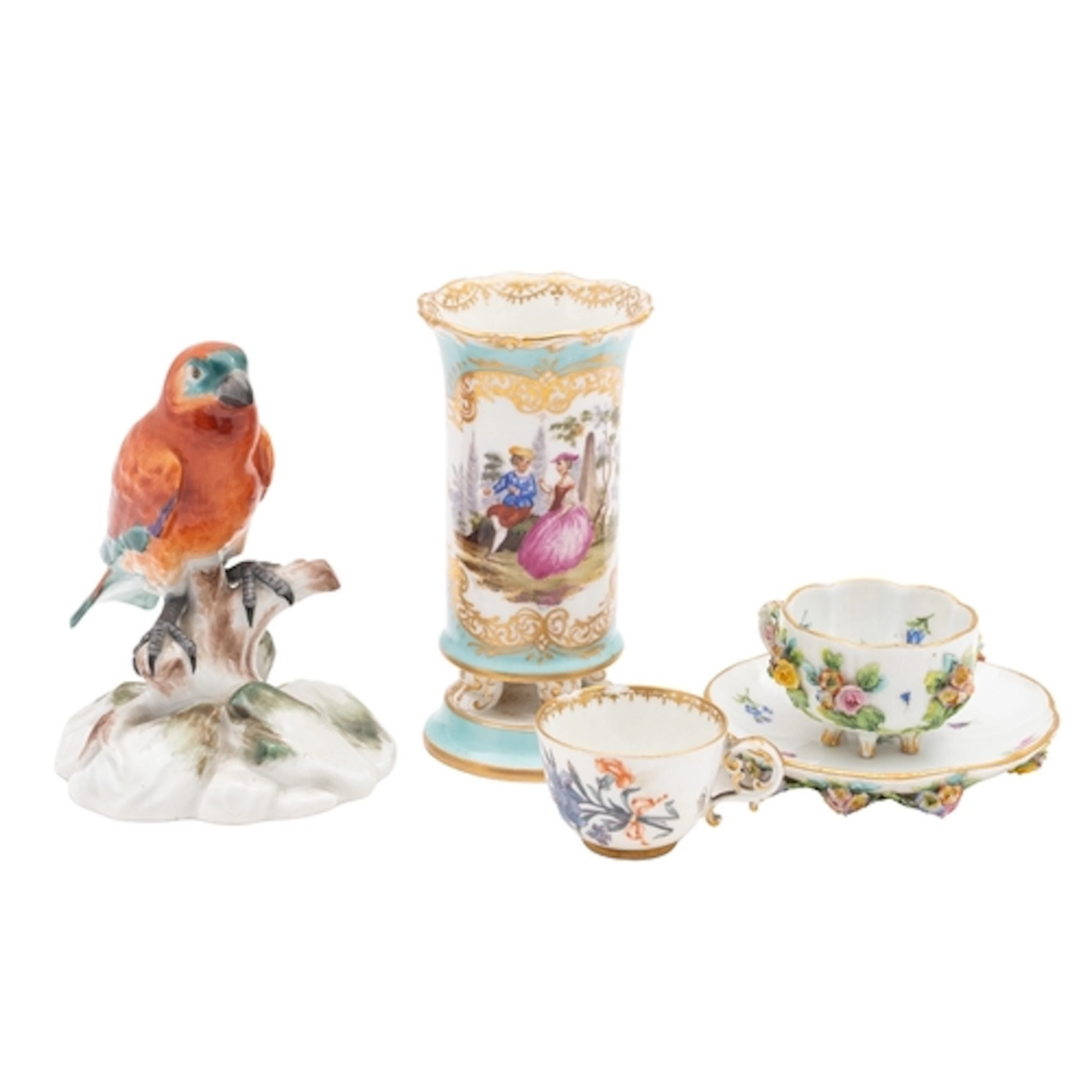 A group of Meissen porcelain comprising: a small lobed cabin...