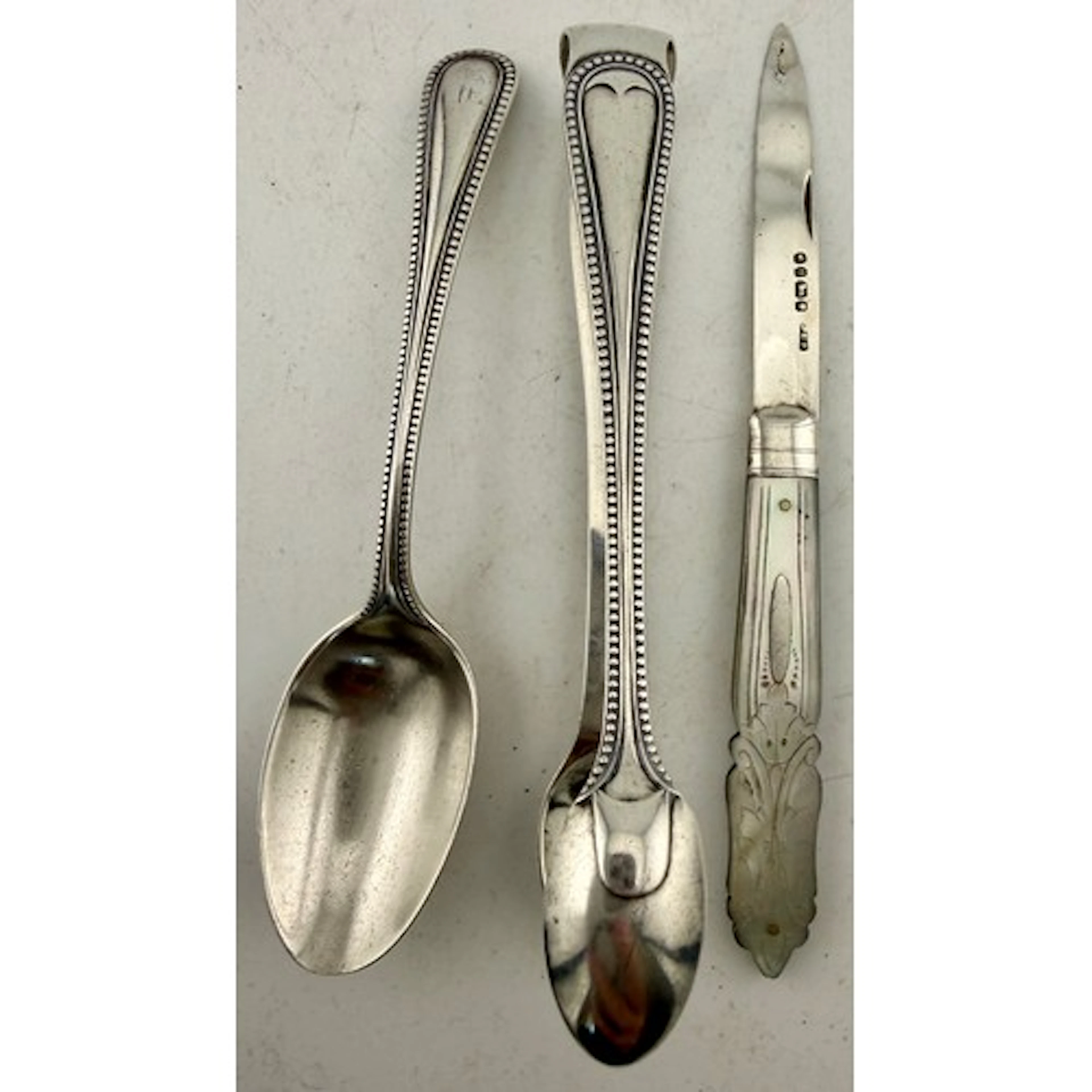 Silver sugar tongs together with silver spoon and a Victoria...