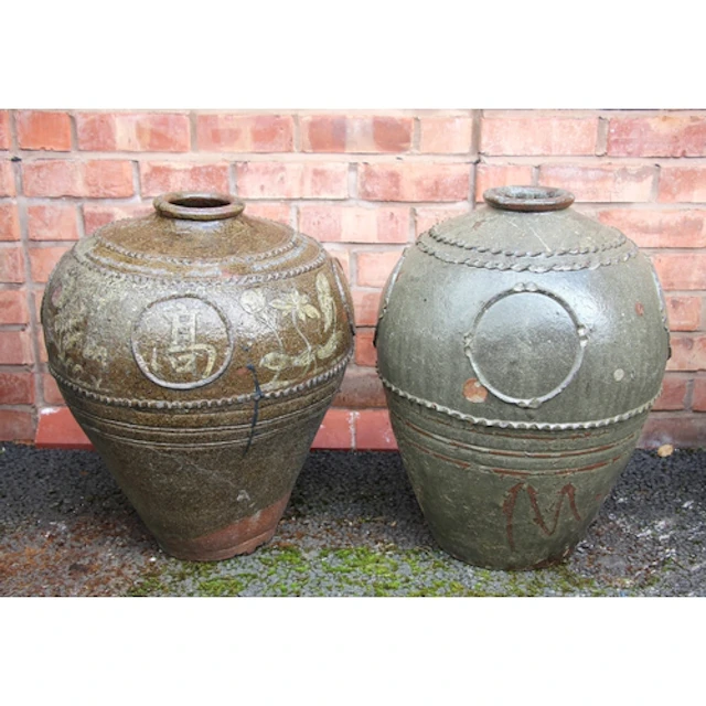 A near pair of Chinese Han Dynasty style glazed vases, each ...