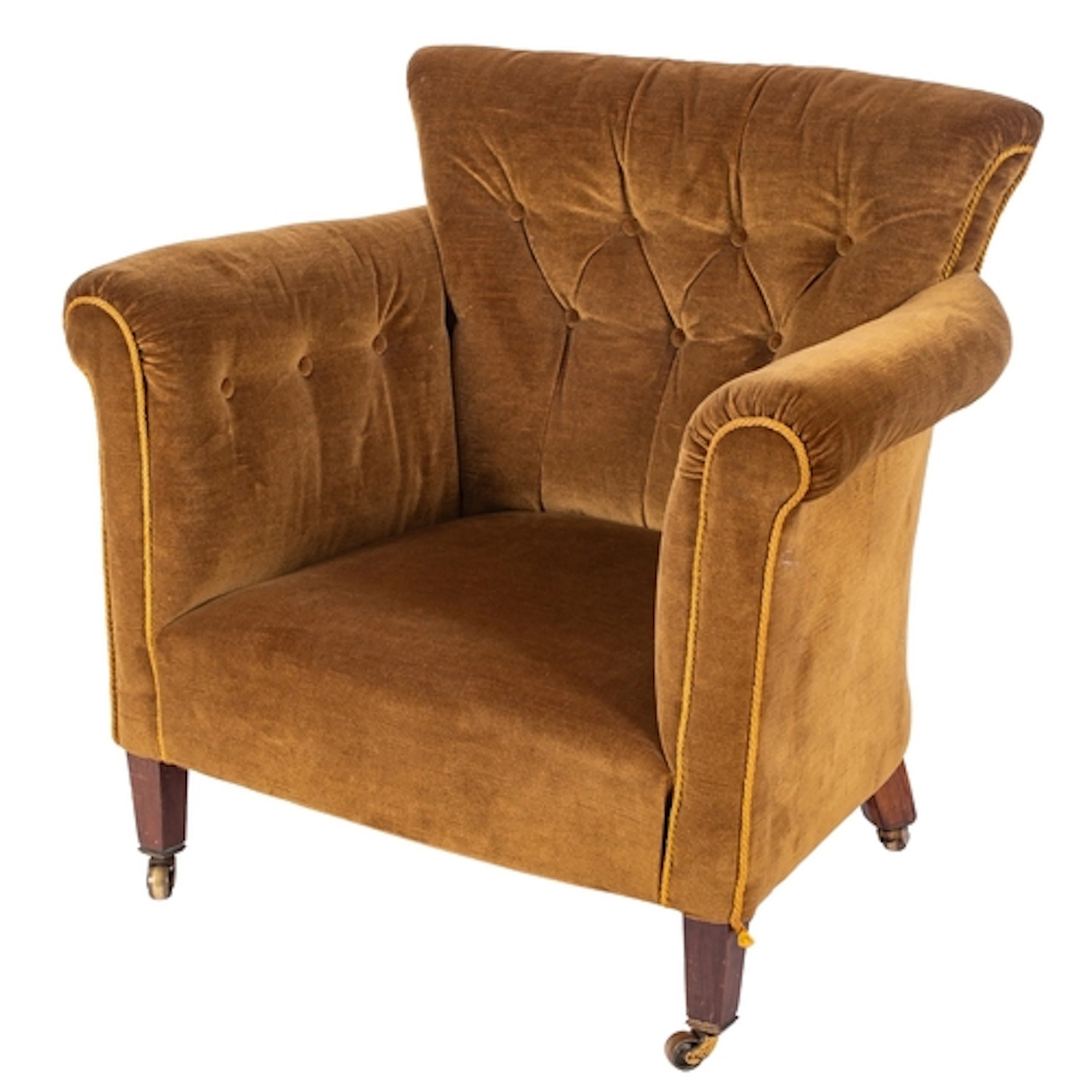 A Victorian 'Woodstock' chair in the manner of Howard & Sons...