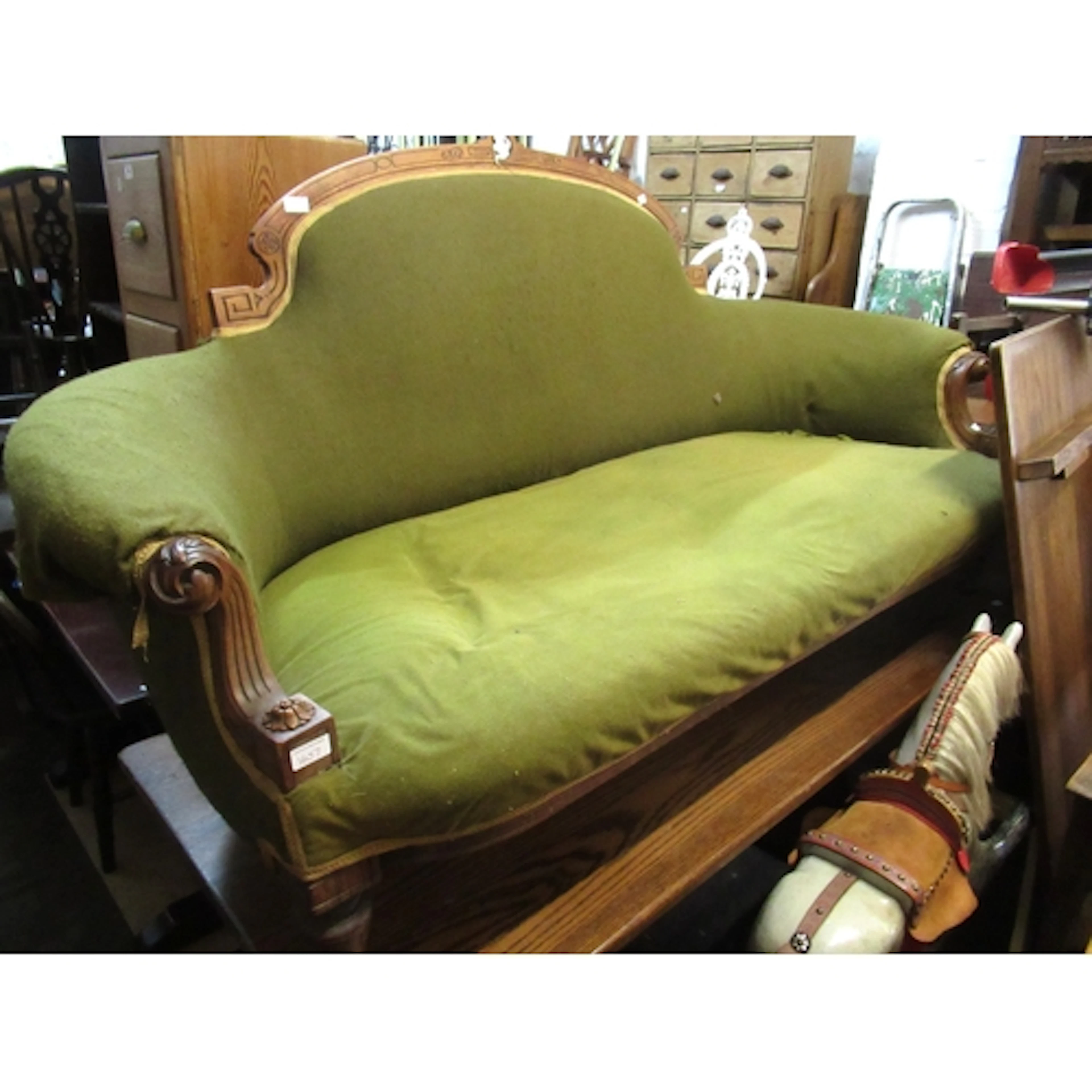 Victorian walnut and upholstered drawing room sofa, on turne...