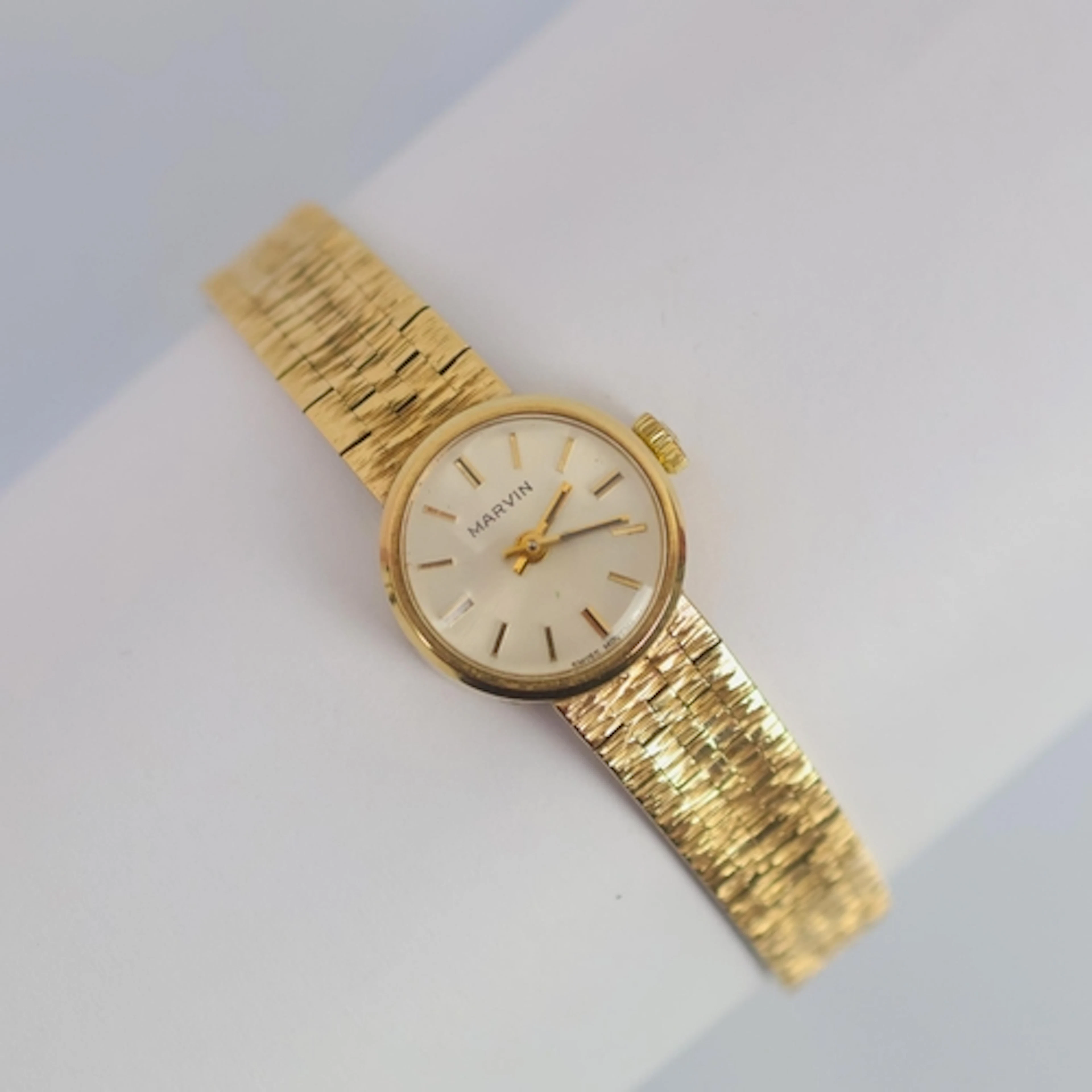 A late 20th century 9ct gold Marvin ladies wristwatch, the c...
