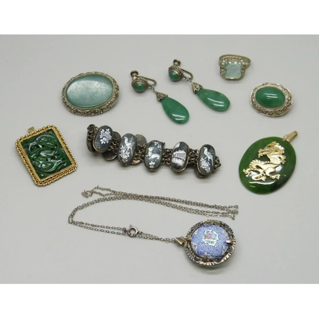A collection of mainly Chinese jewellery including jade/jade...