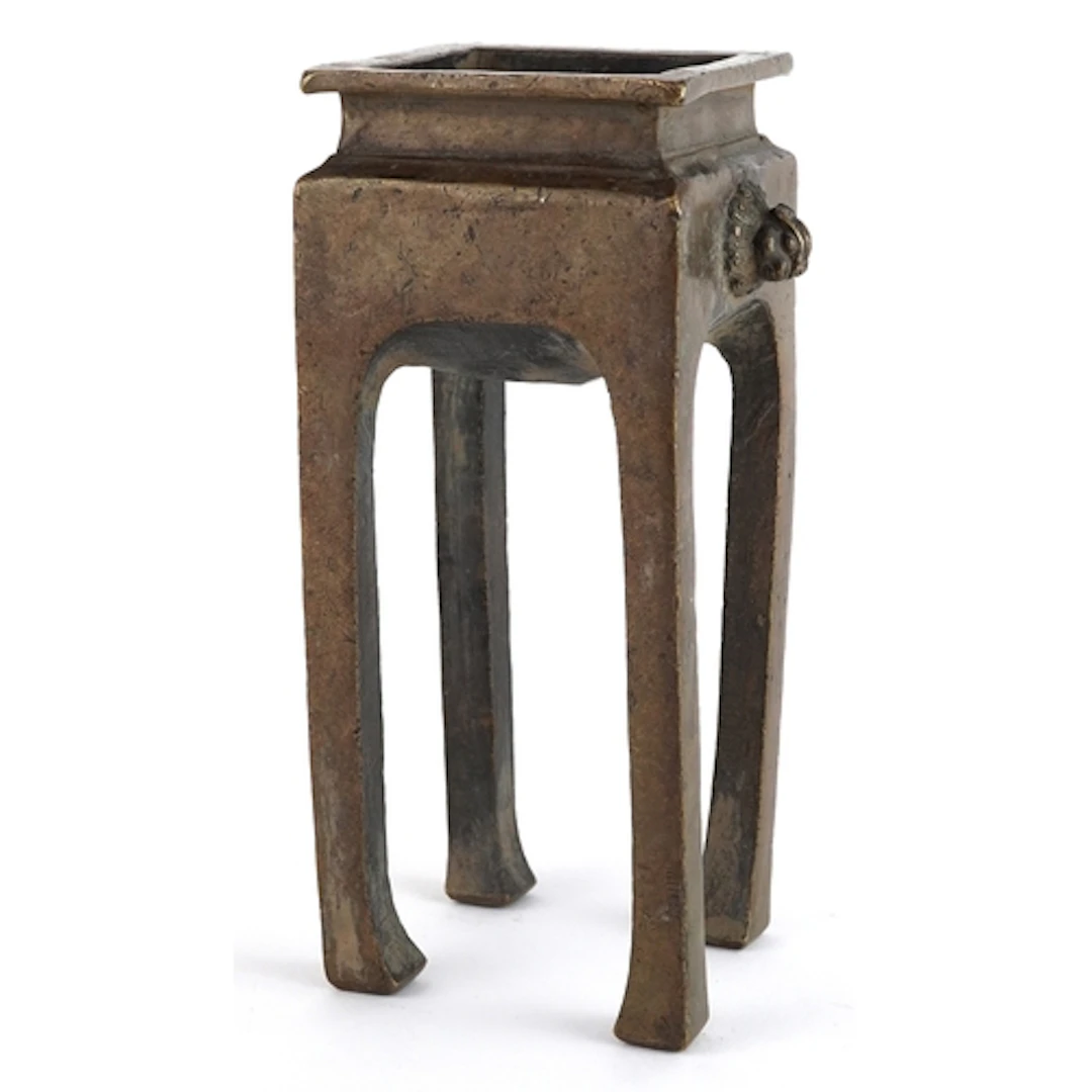 Chinese bronze four footed censer, 17.5cm high.