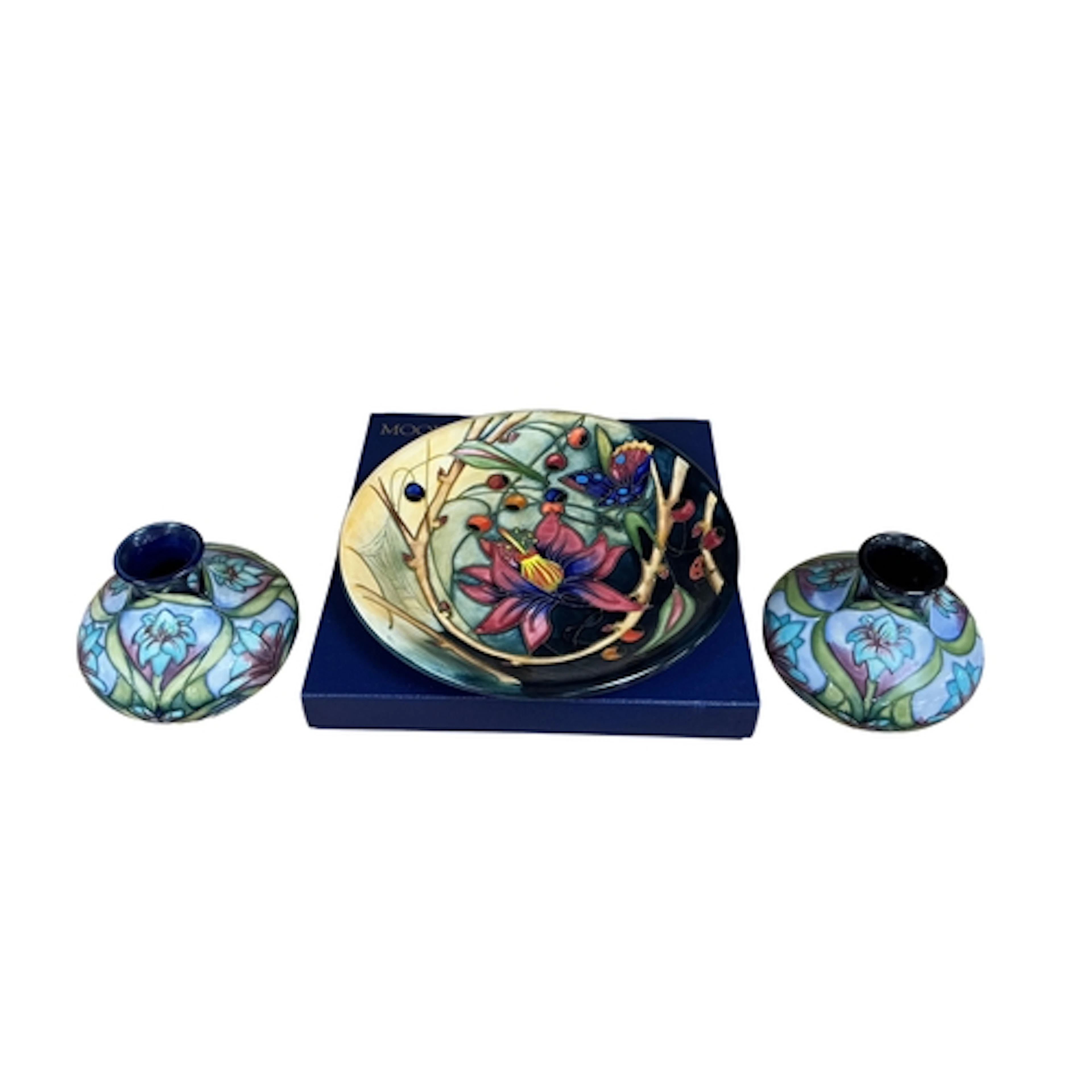 A pair of modern Moorcroft vases in the Cleopatra pattern by...