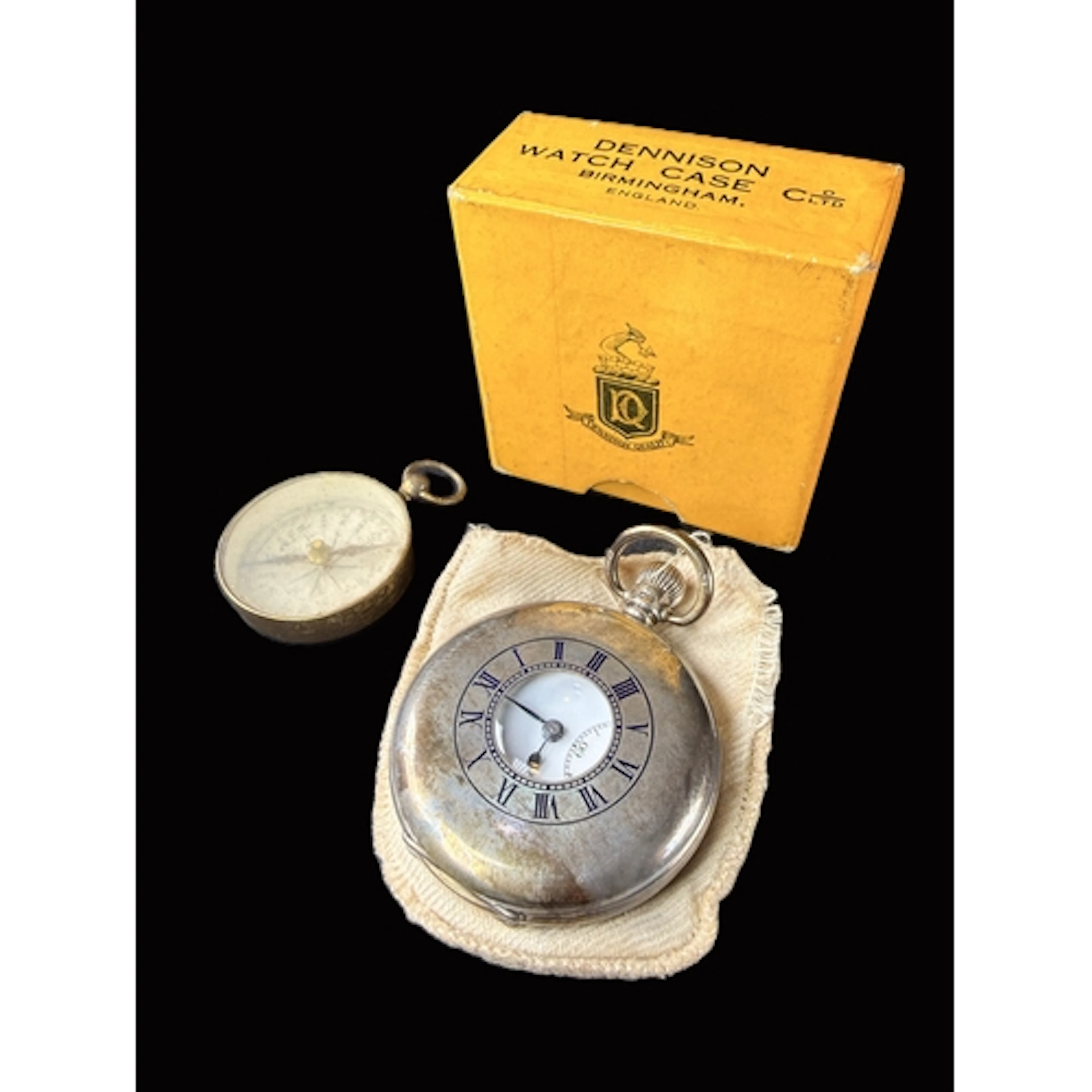 A hall marked silver Dennison half hunter pocket watch with ...