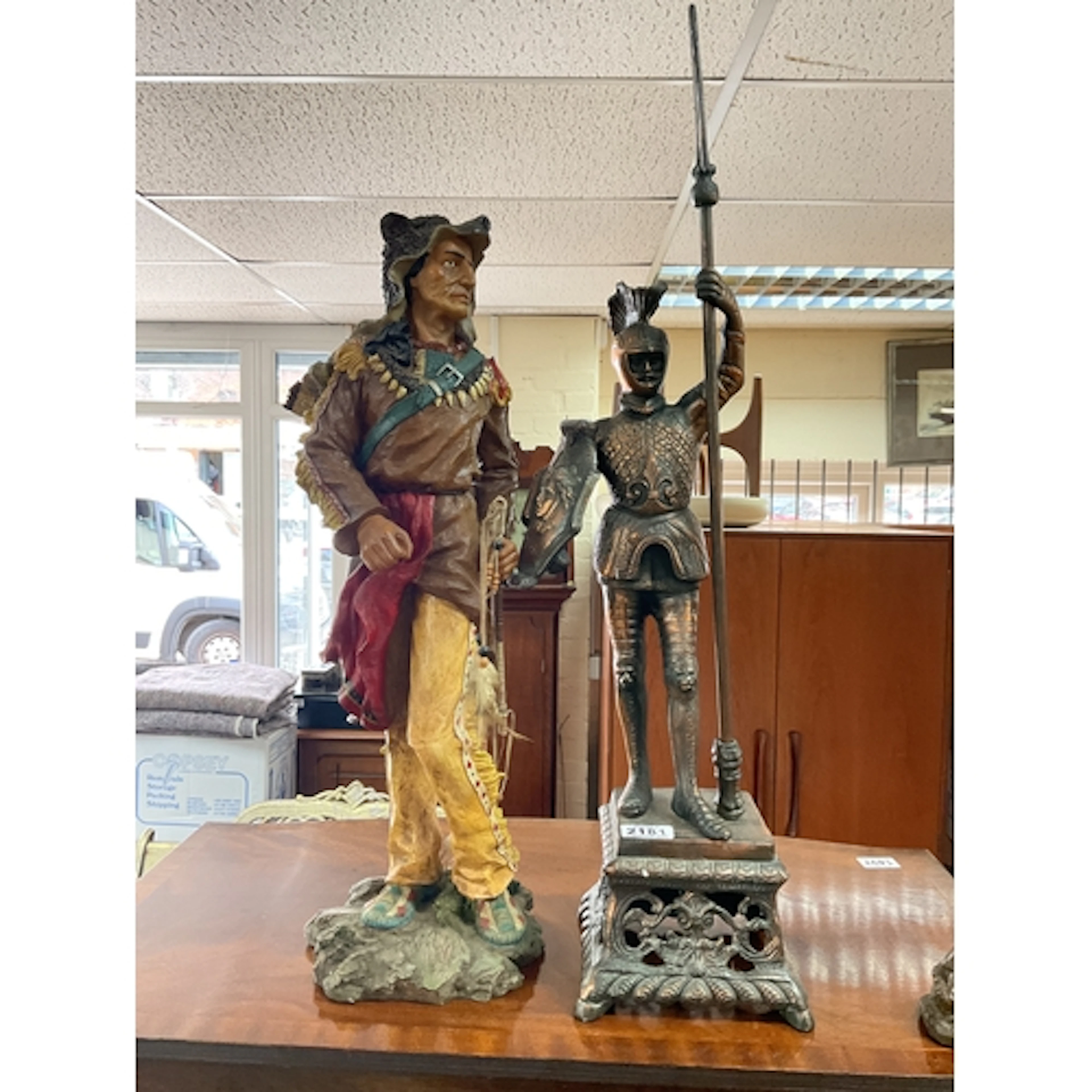 Large metal knight figure along with a resin Indian figure a...