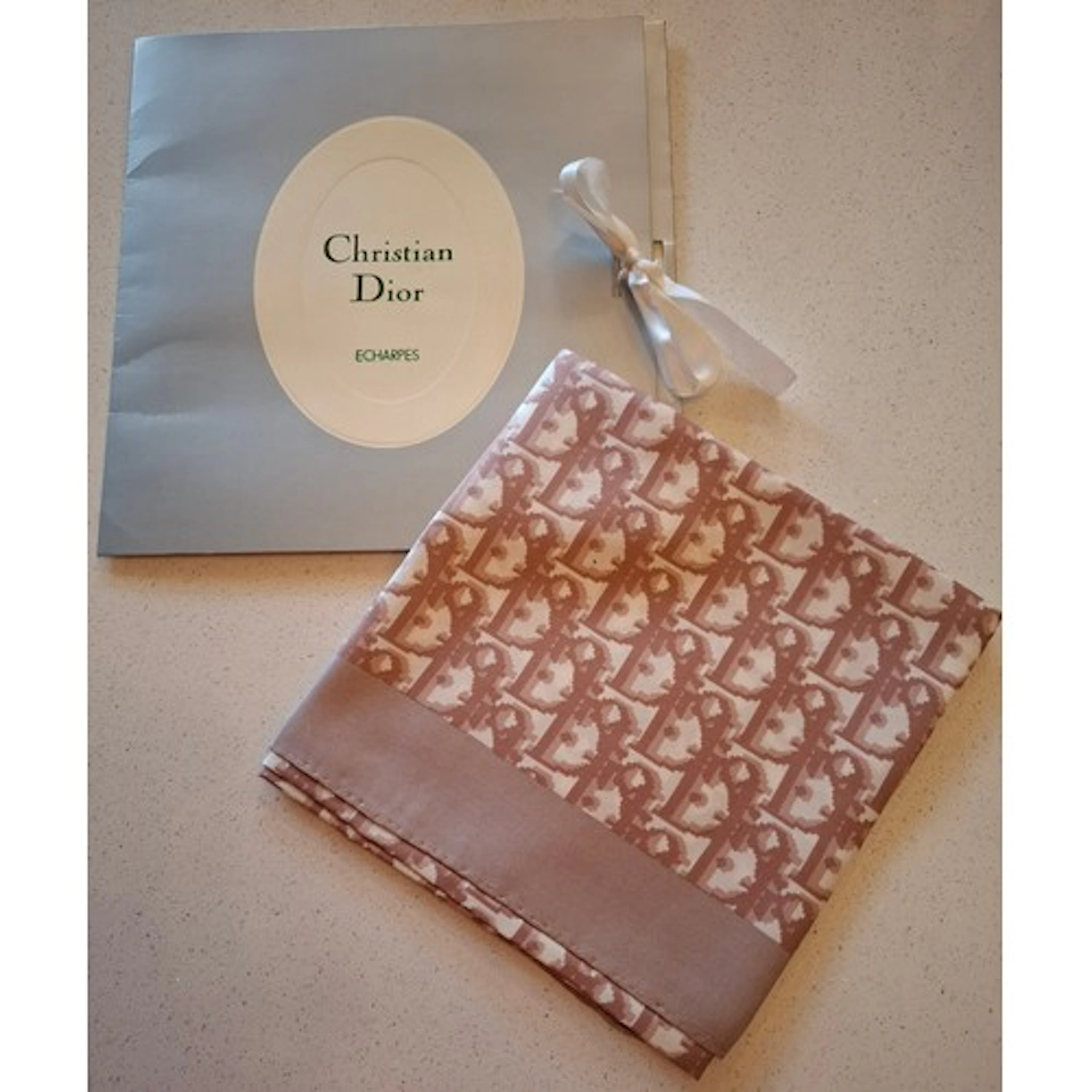 Christian Dior- A vintage white silk scarf with branded Dior...