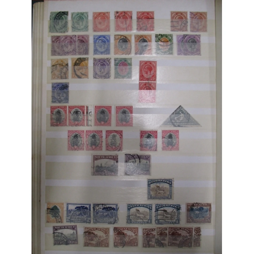 A mixed mint and used GB and world collection in approx. 25 ...