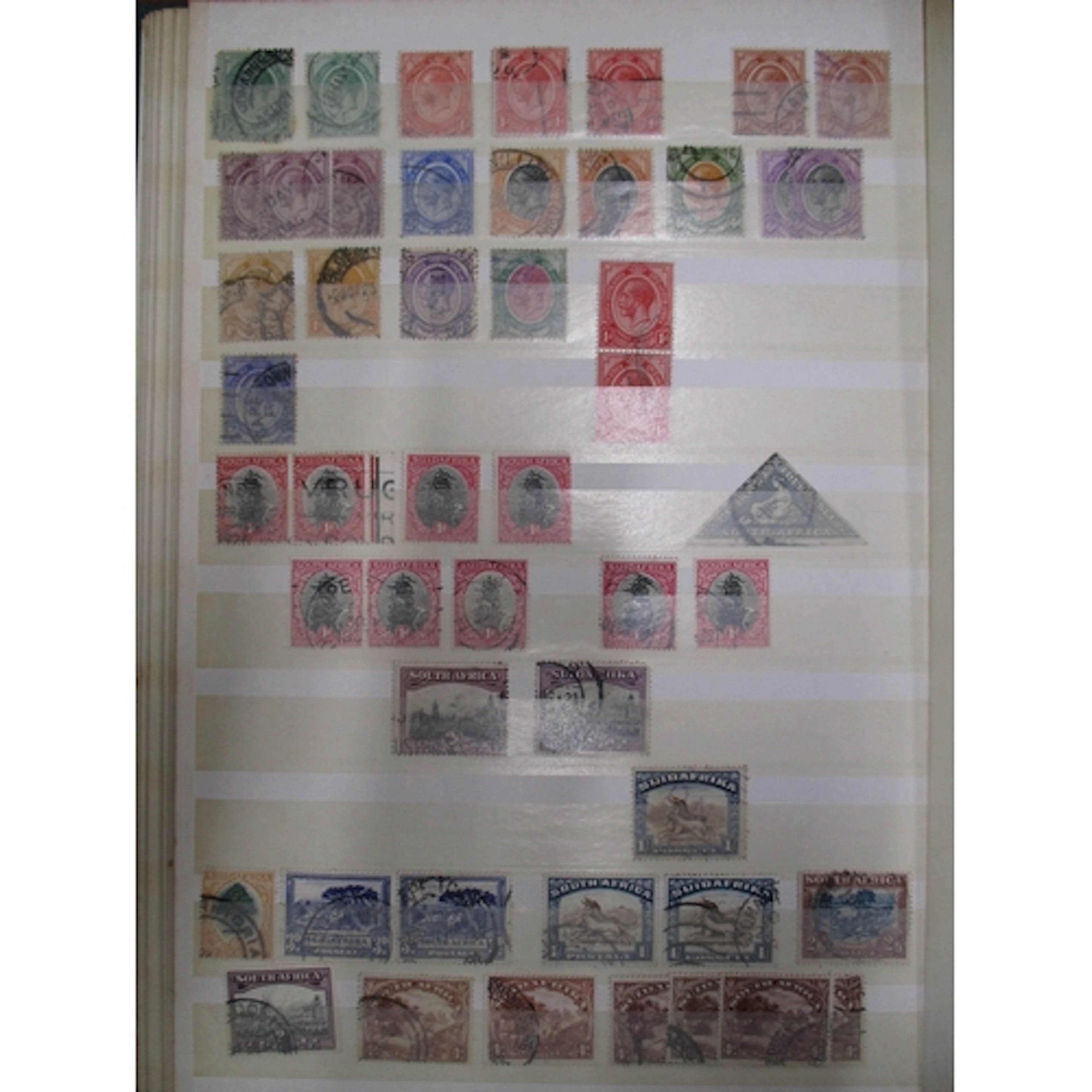 A mixed mint and used GB and world collection in approx. 25 ...