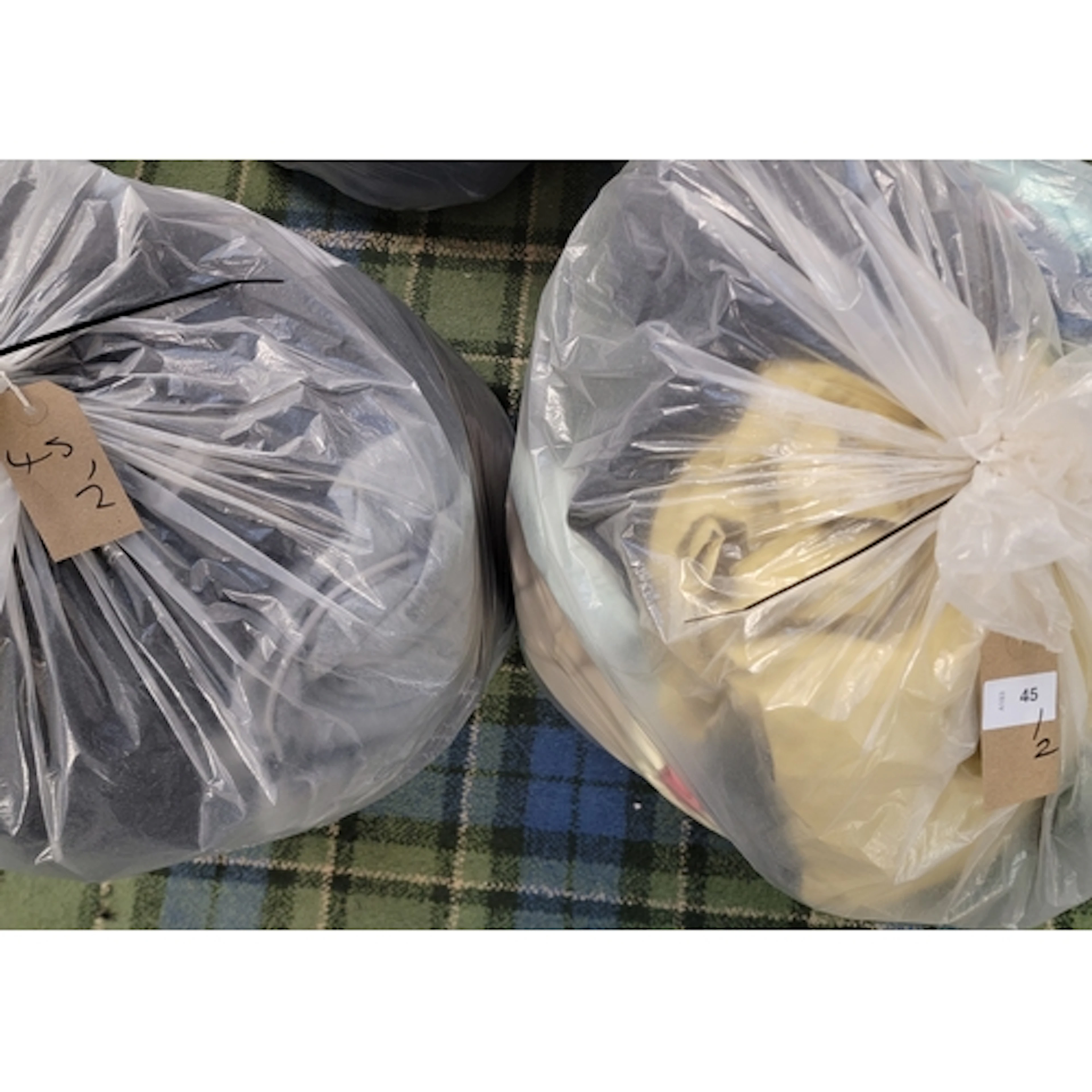 TWO BAGS OF GENTS CLOTHING ITEMS including: Nike, Uniqlo, Hu...
