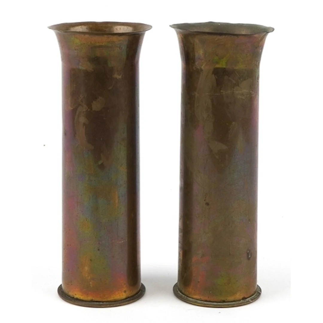 Two British military World War I brass shell cases, each wit...