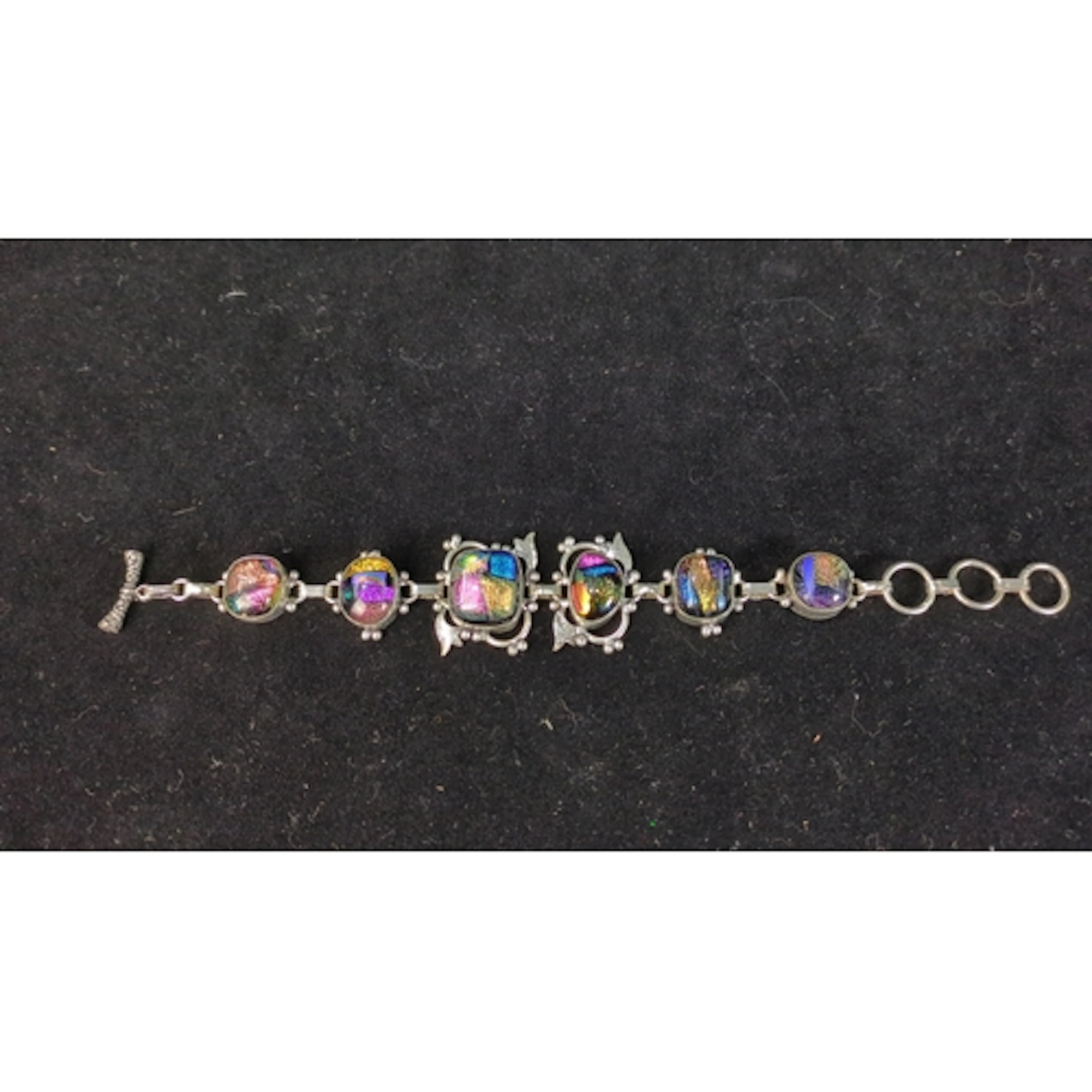 Silver link bracelet set with multicoloured dichroic glass c...