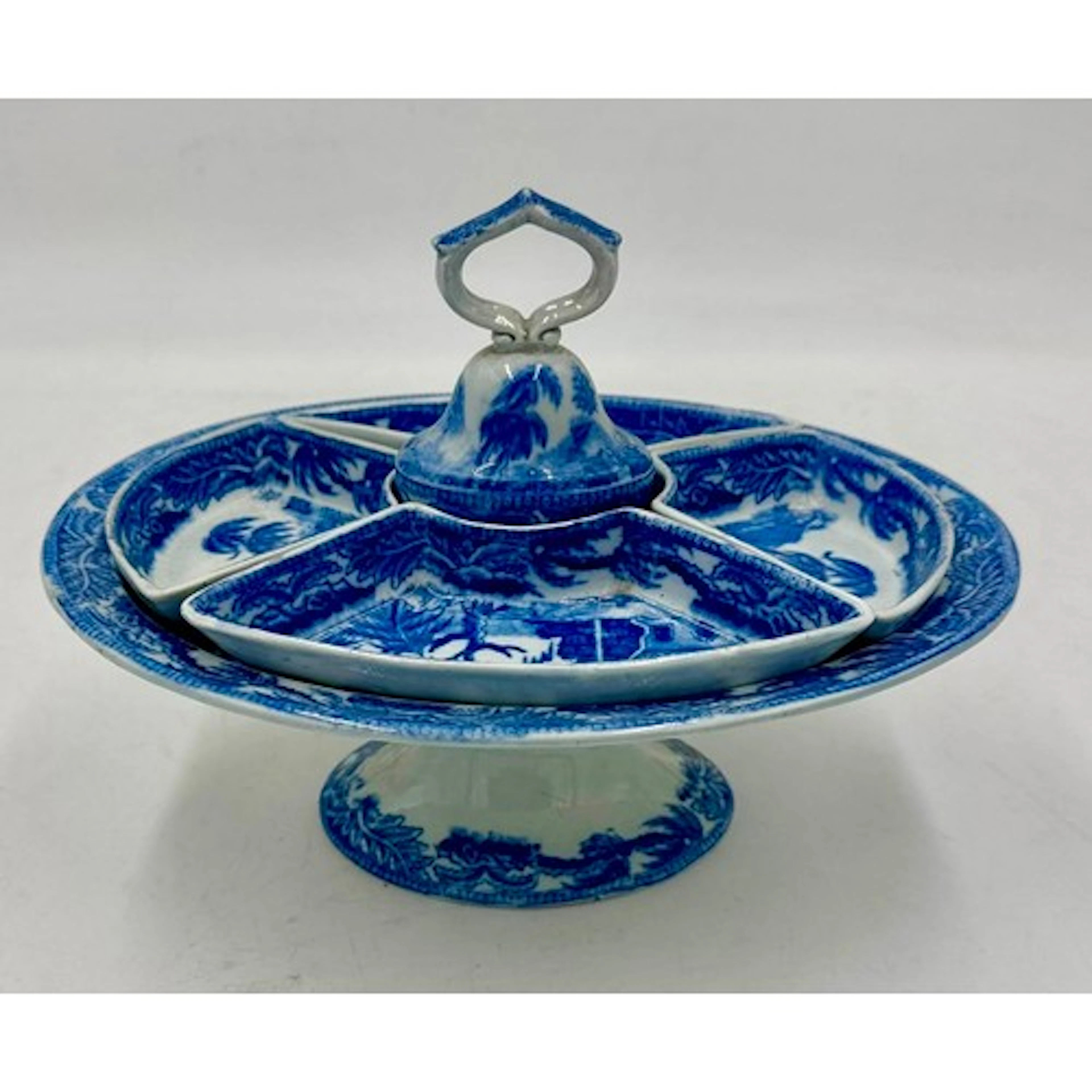 An early 19th century blue and white transfer-printed footed...