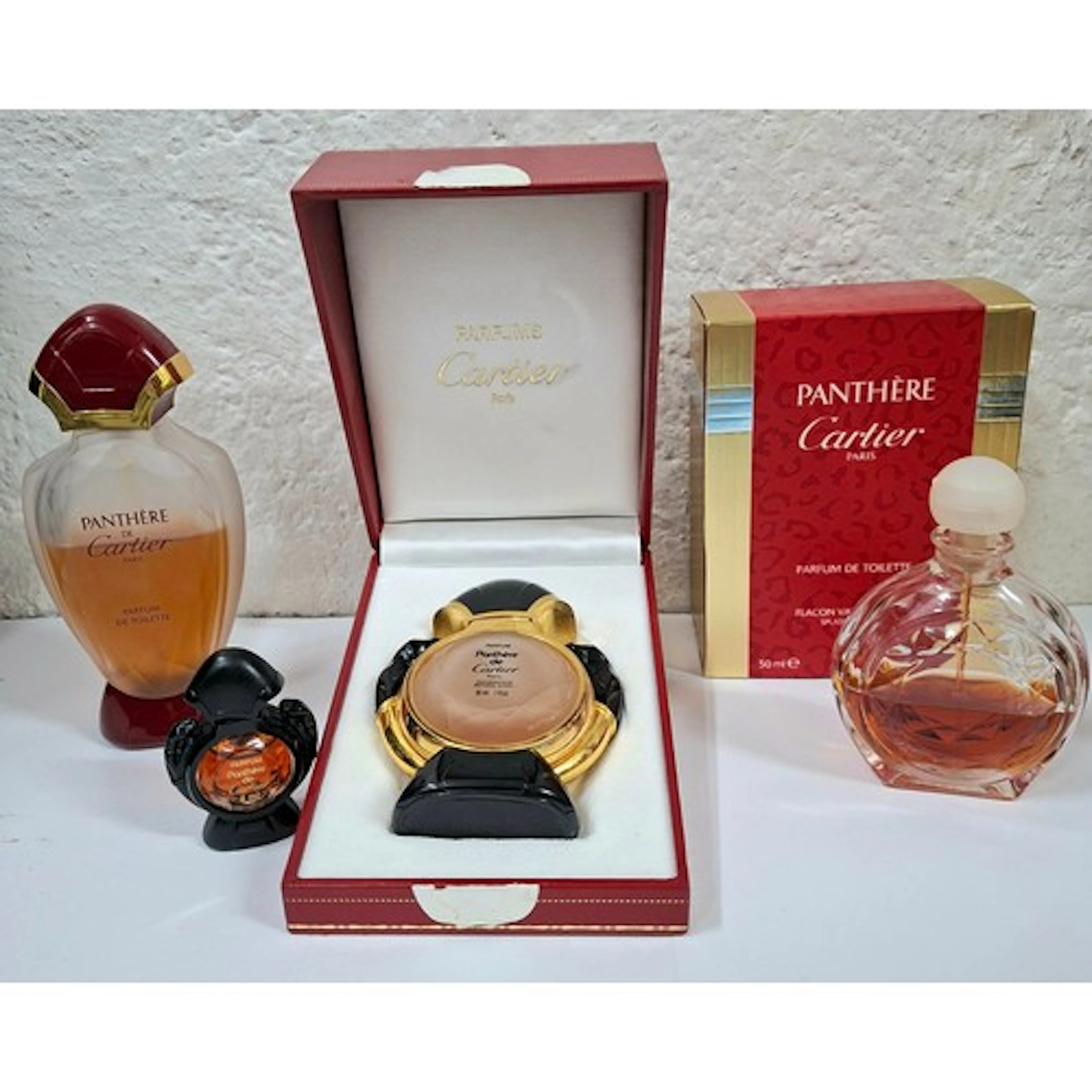 Cartier- A group of 4 partially filled Panthere fragrances, ...