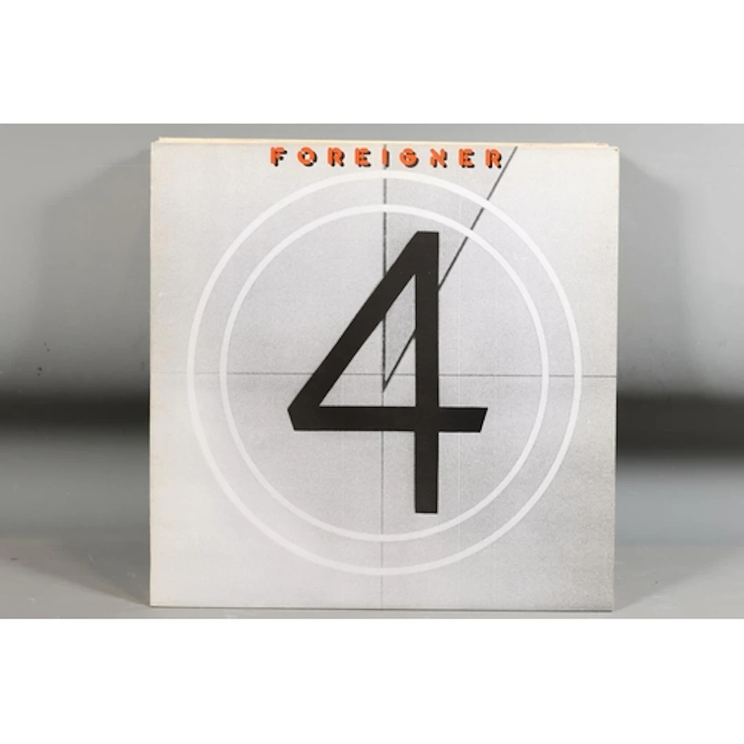 Mixed vinyl records and 12'' singles to include Foreigner, R...